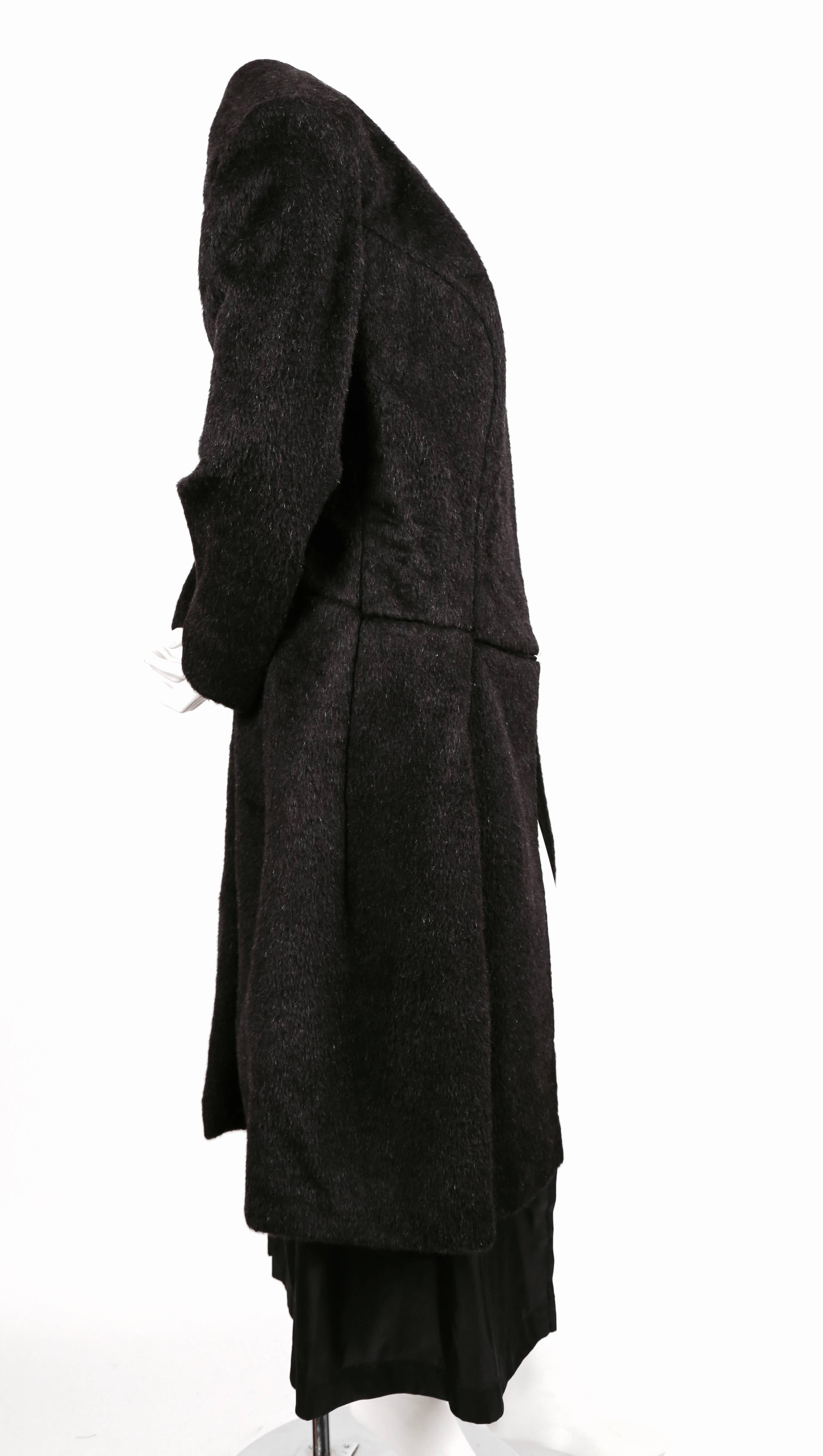 Charcoal grey alpaca hair coat by Comme Des Garcons exactly as seen on the runway for the 1997 Autumn/Winter collection. Size 'M' although this coat has a loose fit. Approximate measurements: shoulder 17