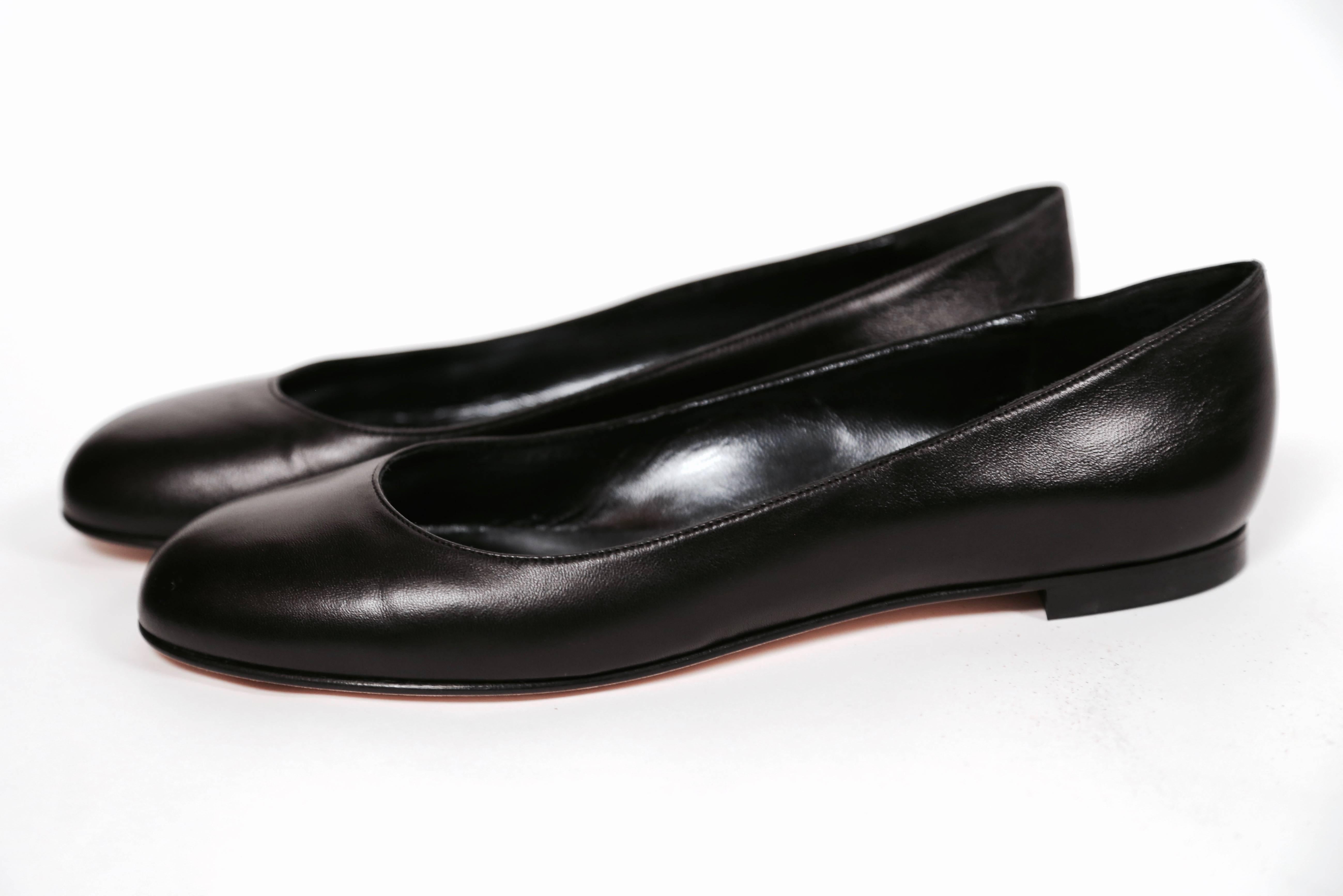 Unworn classic black ballet flats from Manolo Blahnik dating to the early 2000's. Shoes are labeled a size 40.5 which best fits a U.S. 9.5. Insoles measure approximately: 10.33