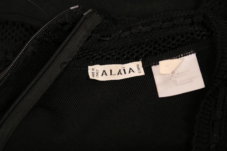 1993 AZZEDINE ALAIA jet black long sleeveless dress with open lace knit ...