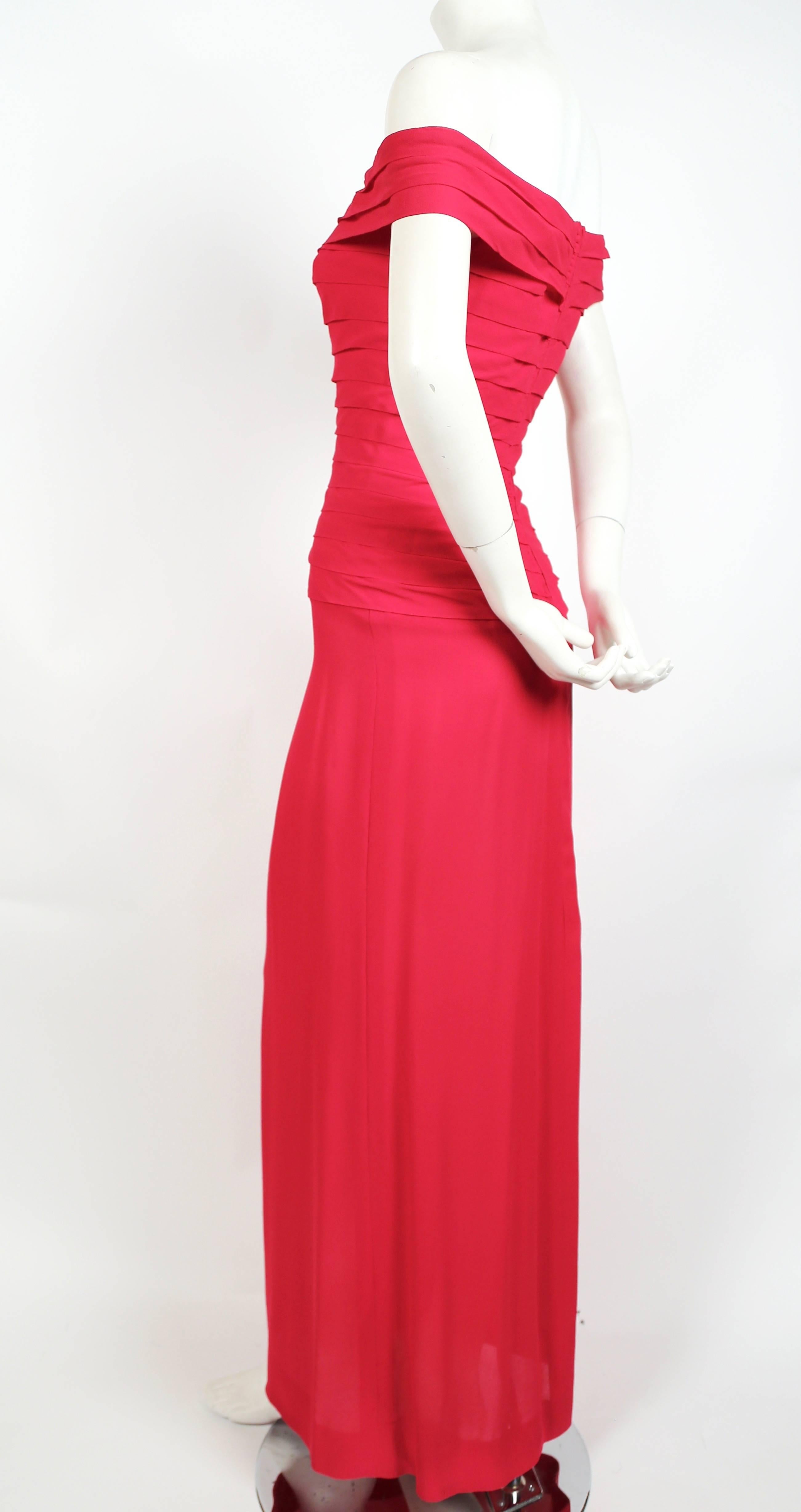 Red 1970's LORIS AZZARO haute couture fuchsia silk gown with horizontal pleating