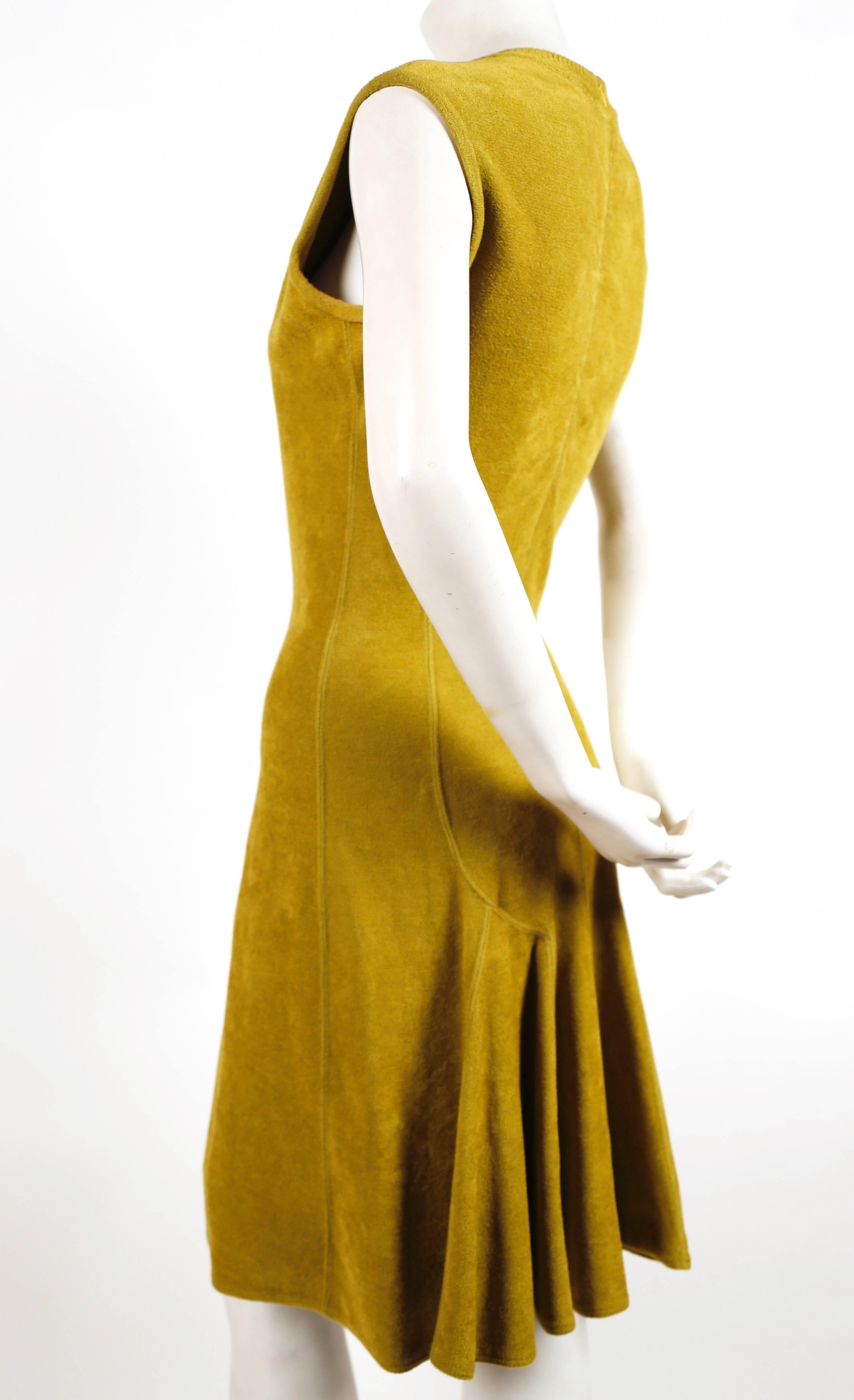 Vivid chartreuse chenille V-neck dress with flared skirt from Azzedine Alaia dating to the late 1990's. Labeled a size 'S' however this will easily accommodate a size medium as well. Approximate measurements: bust 34.5