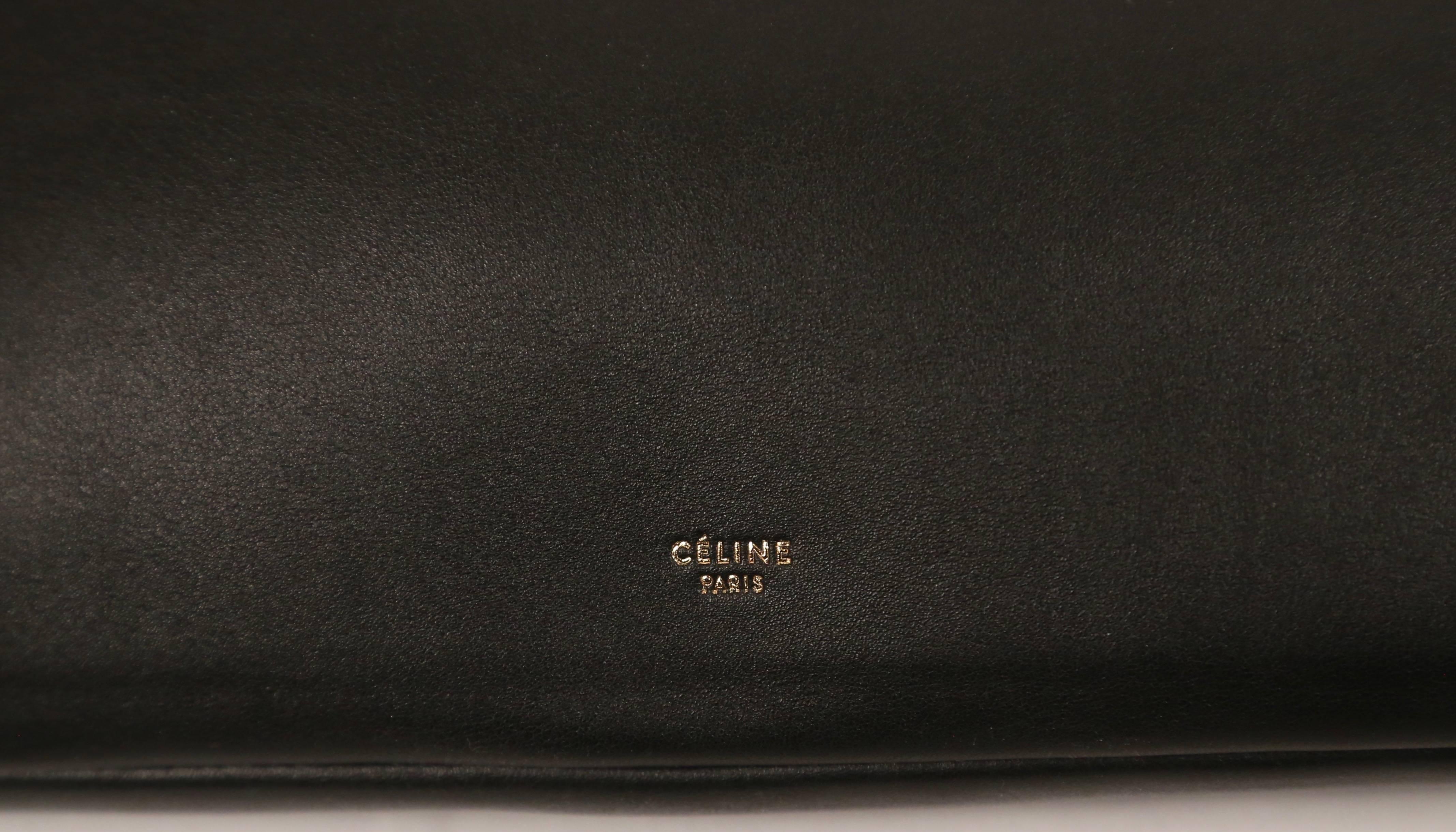 Black new CELINE Phoebe Philo black leather runway bag with triangular metal handle