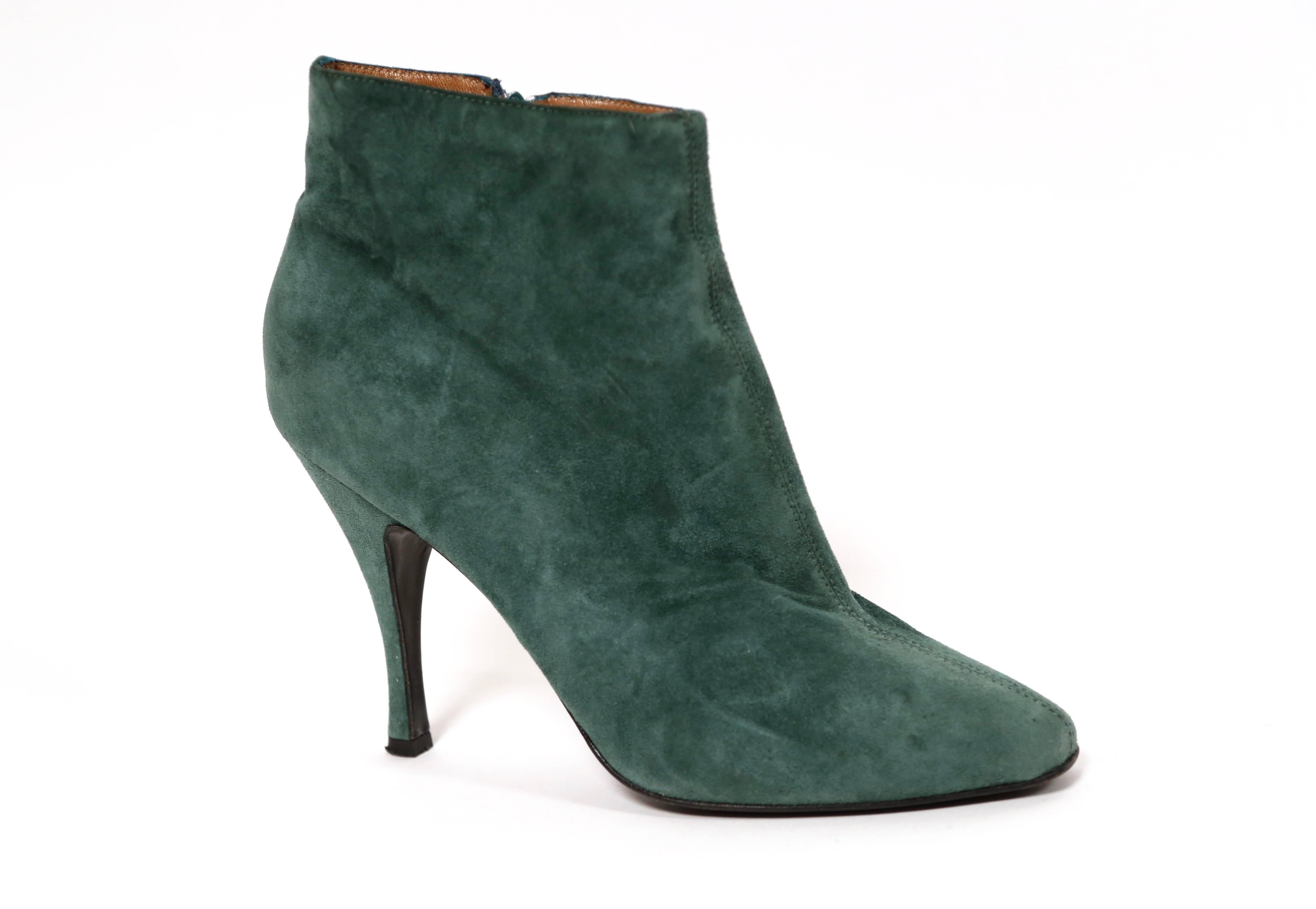Emerald green suede stiletto ankle boots with almond shaped toe from Azzedine Alaia dating to the 1990's. Size 40 (US 9-9.5). Inside zips. Composed entirely of leather. Made in France. Good condition. Also available in black.