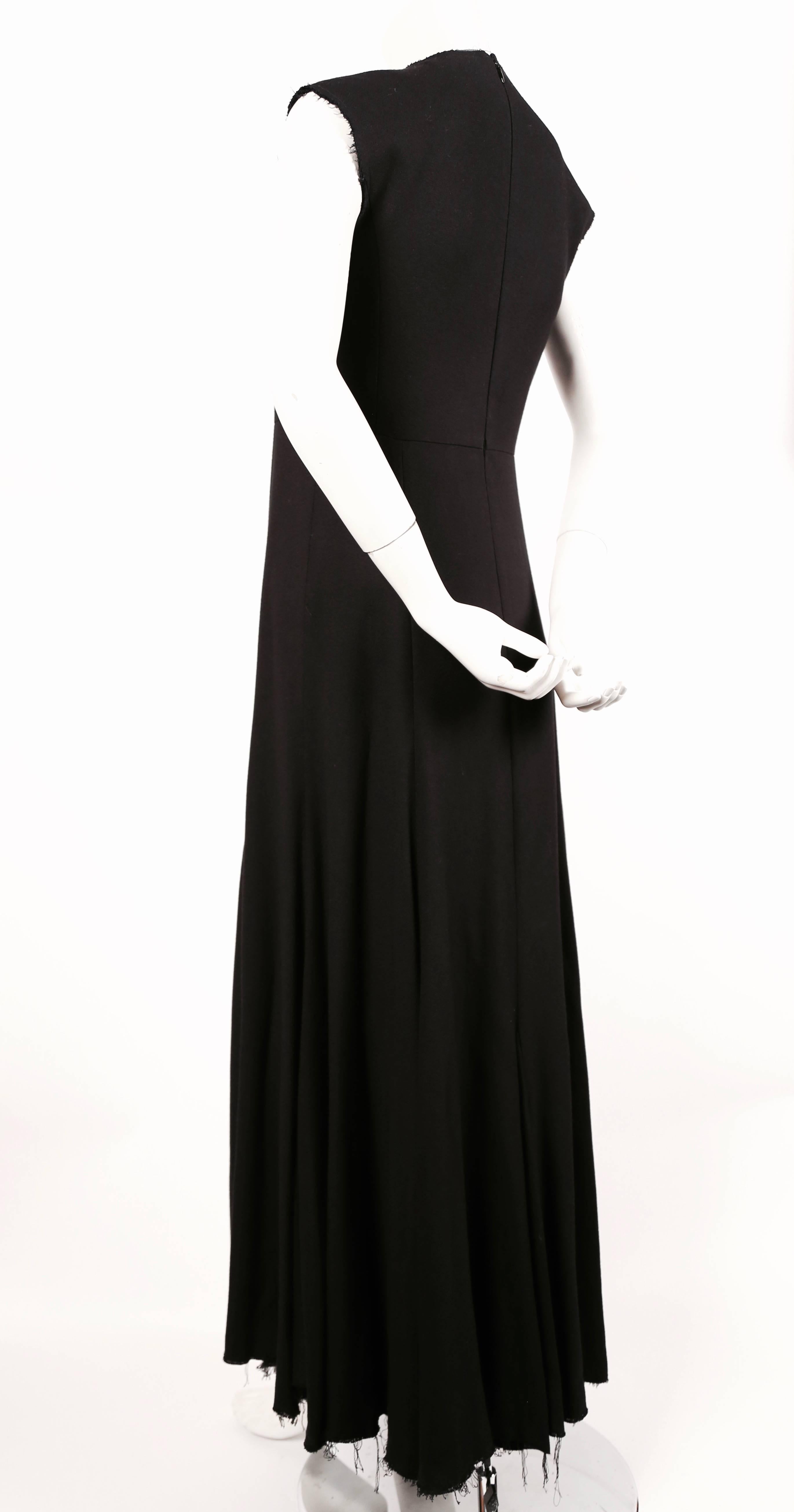 Very rare, black seamed maxi dress with raw edges and fringed hemline designed by Phoebe Philo for Celine exactly as seen on the 2013 spring runway. This is a very difficult to find dress. It is a French size 36 which best fits a size 2. Approximate