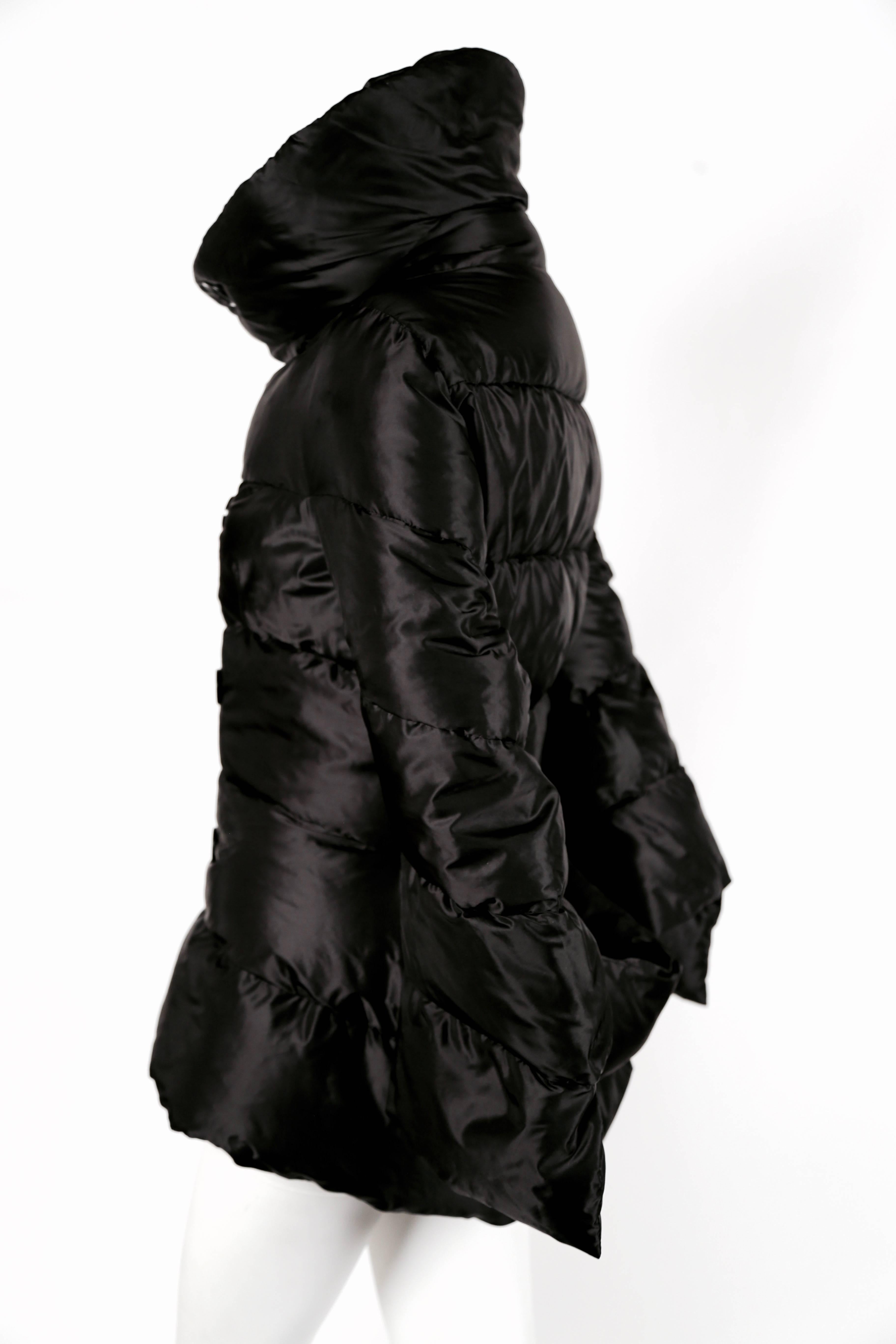 Black Junya Watanabe for Comme des Garcons padded runway coat with bustle, 2009 