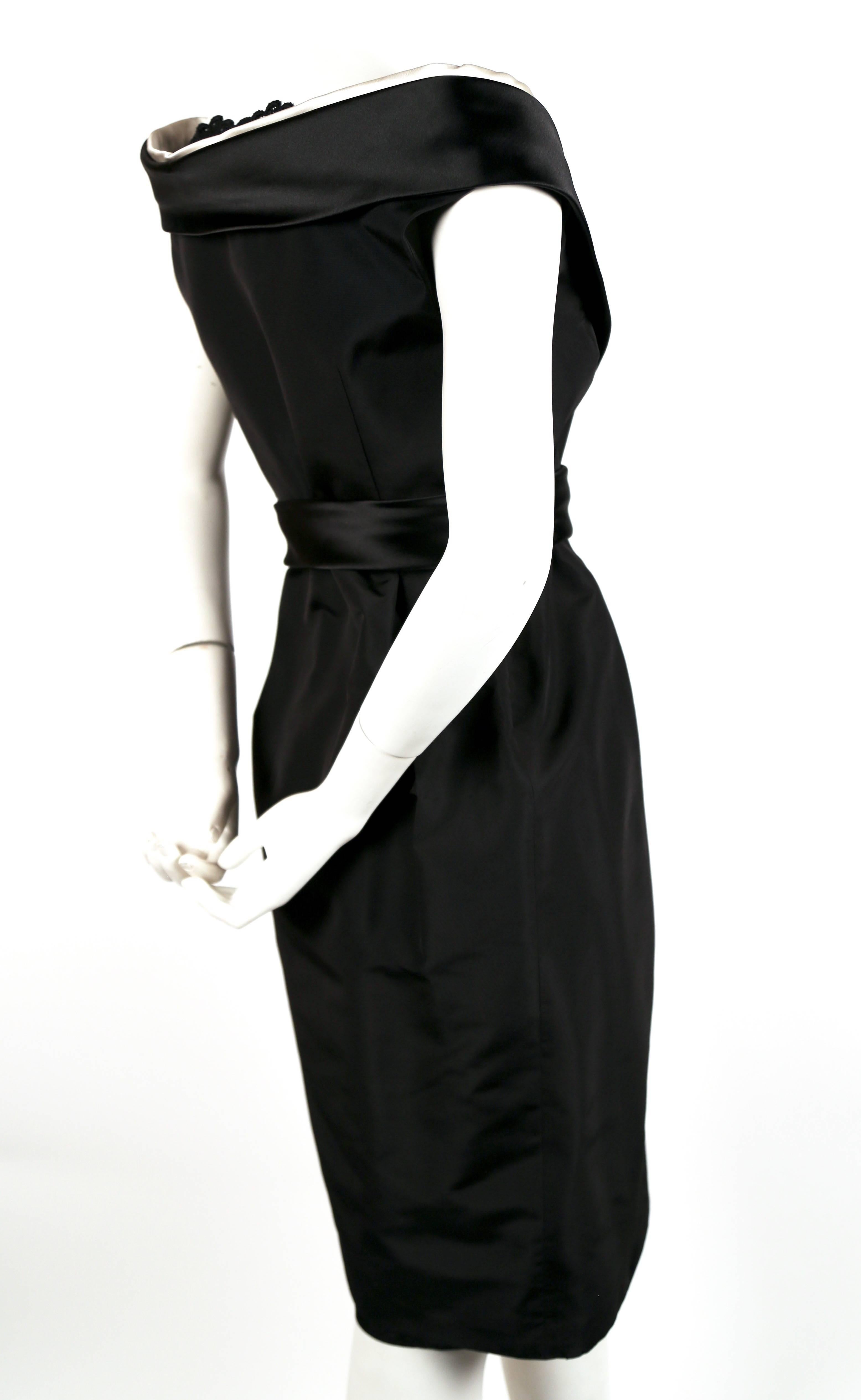 Black Alexander McQueen black satin dress with raised collar, 2006  