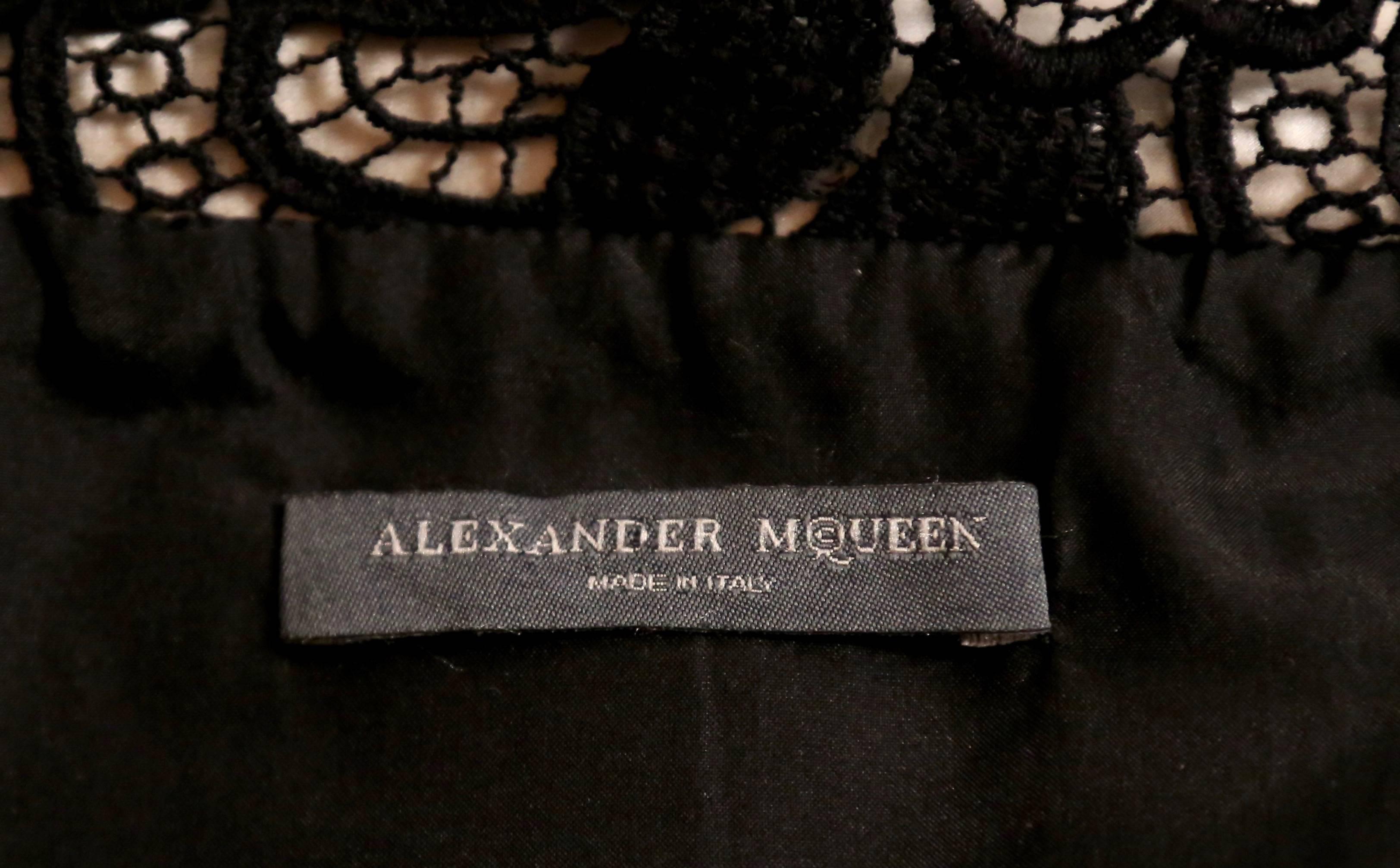 Women's or Men's Alexander McQueen black satin dress with raised collar, 2006  