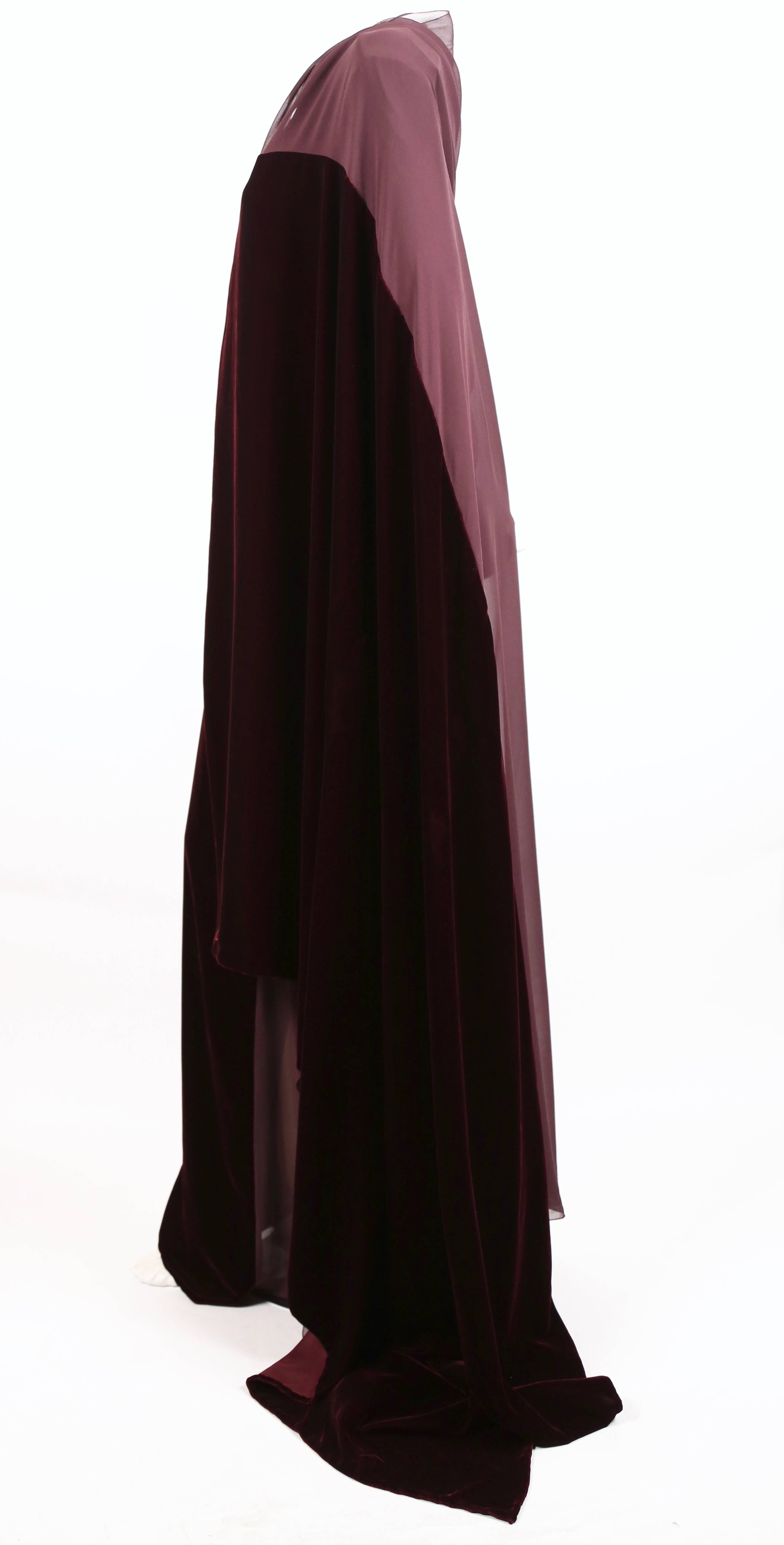Bordeaux colored semi-sheer silk and velvet runway gown with train designed by Gianfranco Ferre exactly as seen on the fall 1997 runway. Gown can be worn with train loose or wrapped over shoulder. Italian size 40. Approximate measurements: shoulder