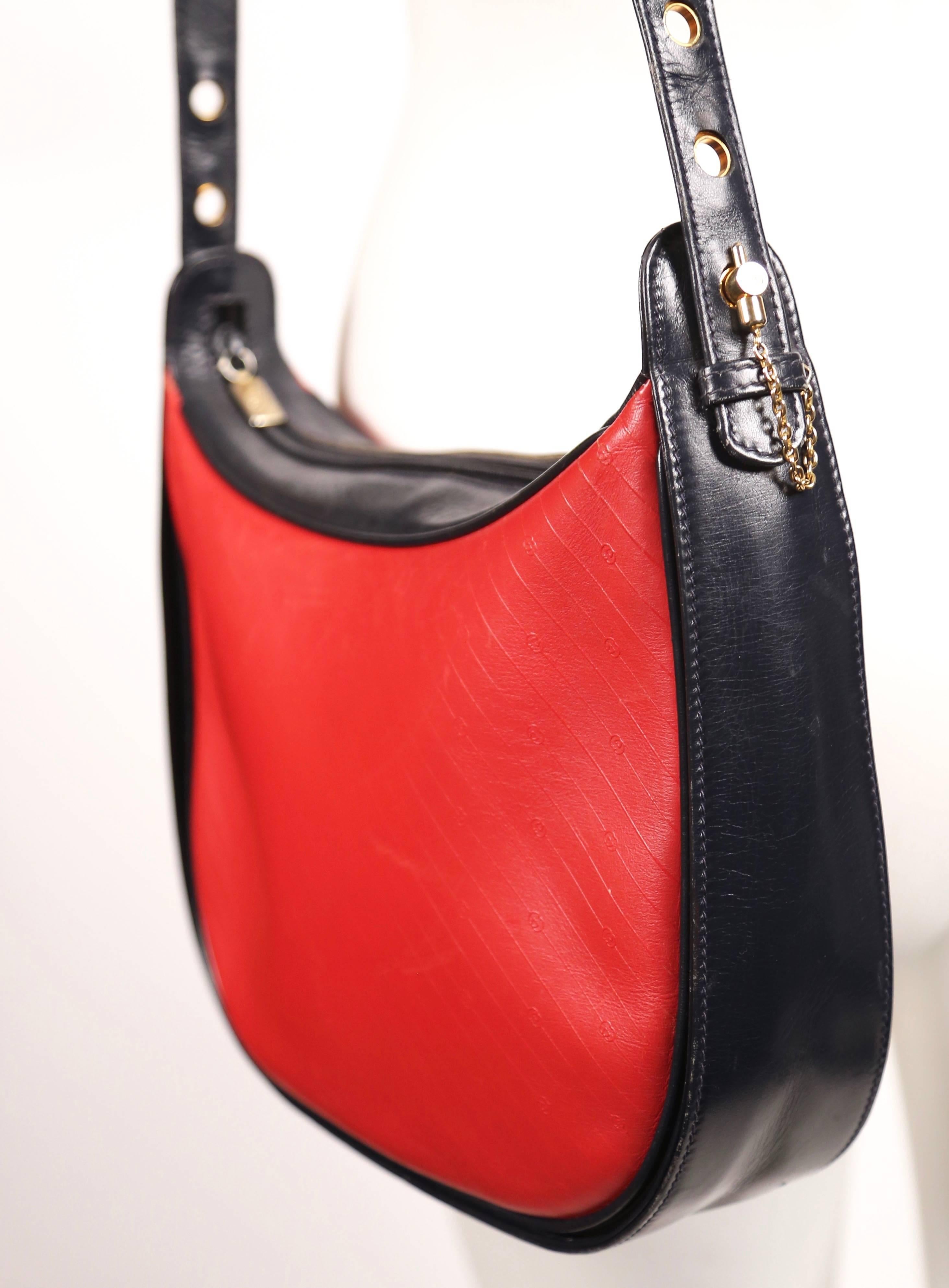 Red 1980's GUCCI navy and red embossed monogrammed leather bag 