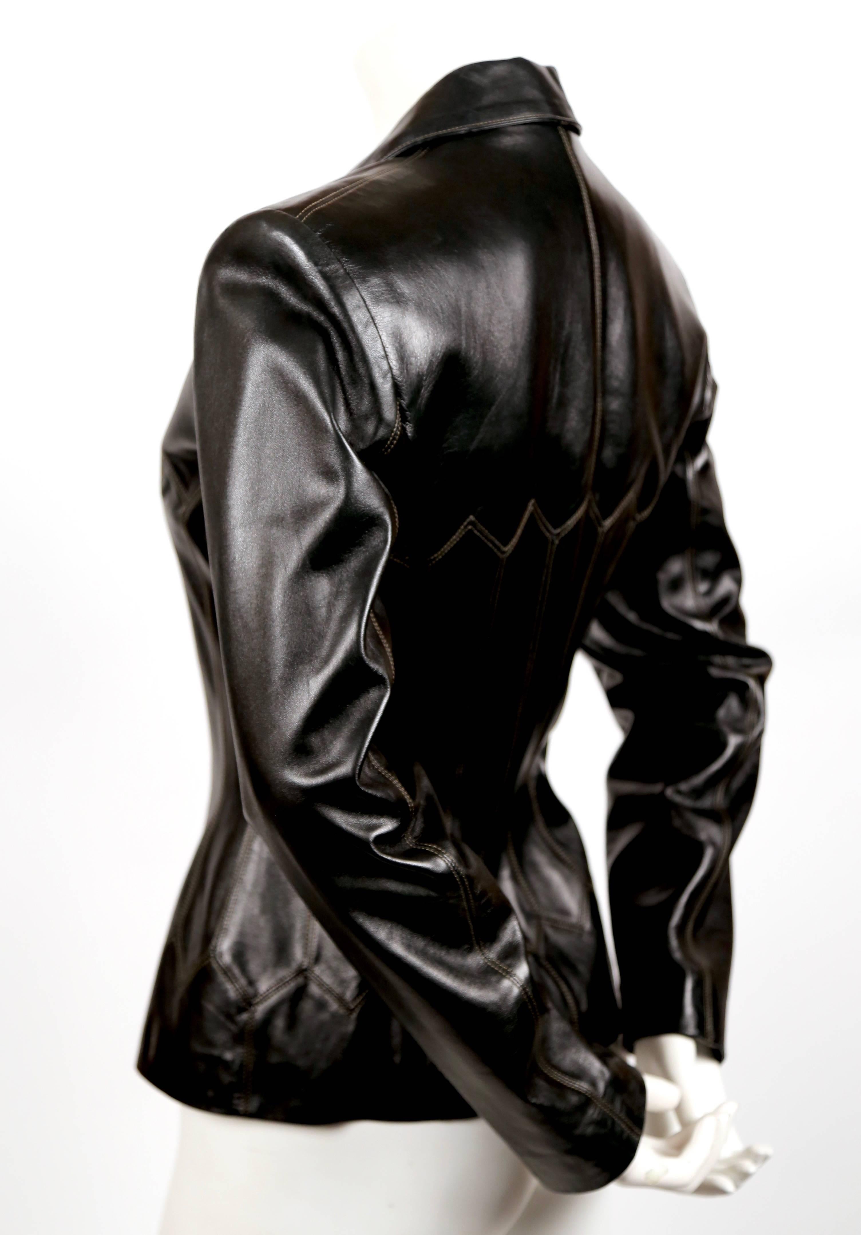 Jet black butter soft leather corset style jacket with decorative topstitching from Alaia dating to spring 1990 exactly as seen on the runway. French size 38 although this jacket is very small and best fits a US size 2 or French 36. Approximate