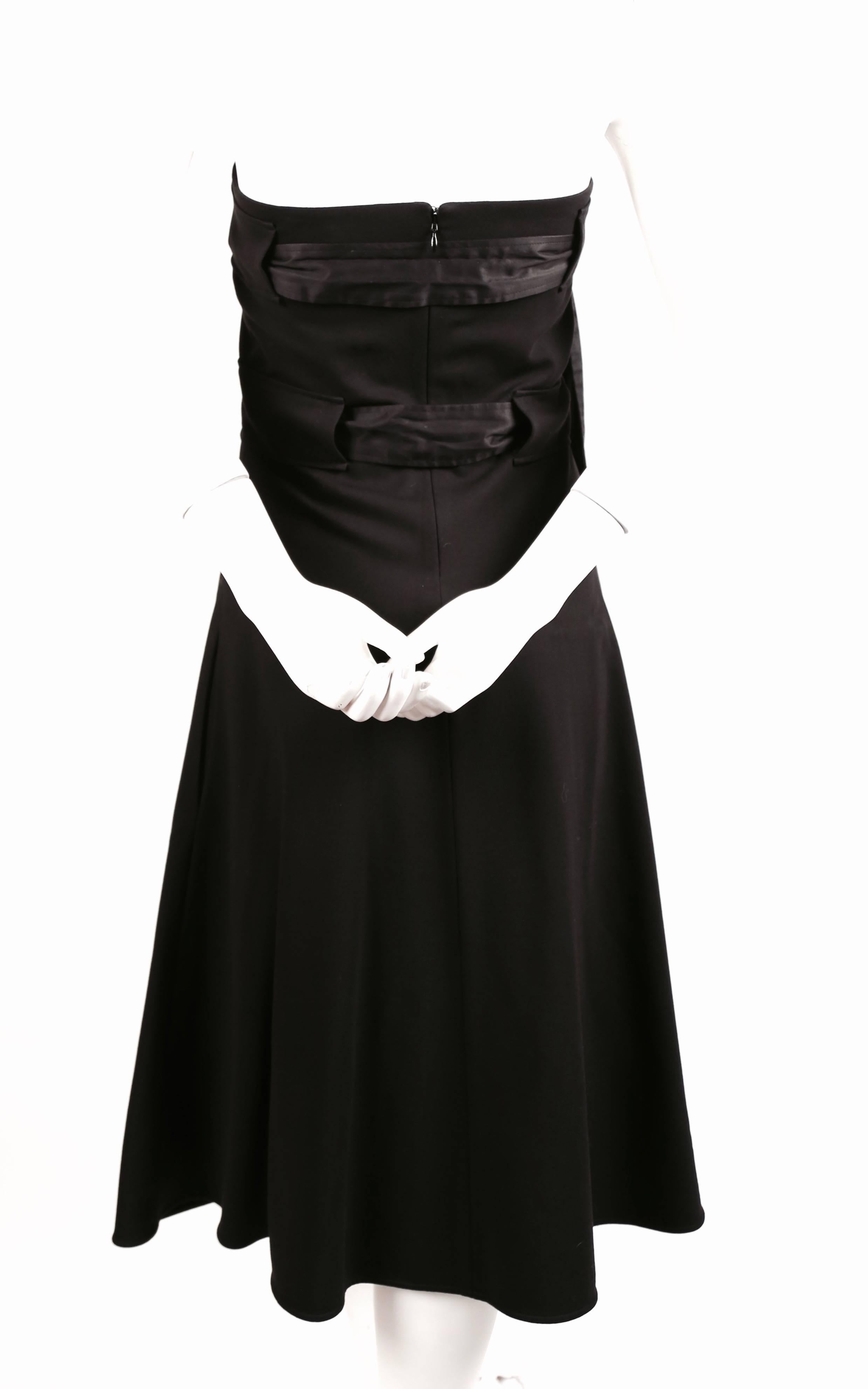 Jet black strapless dress with straps at bust and waist designed by Phoebe Philo for Celine. French size 38 (fits small). Can be dressed up or down. New with tags.
