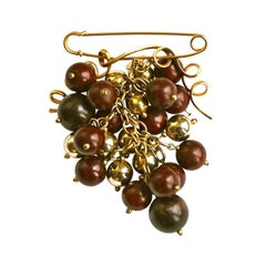 1990's YVES SAINT LAURENT rive gauche brooch with wooden beads