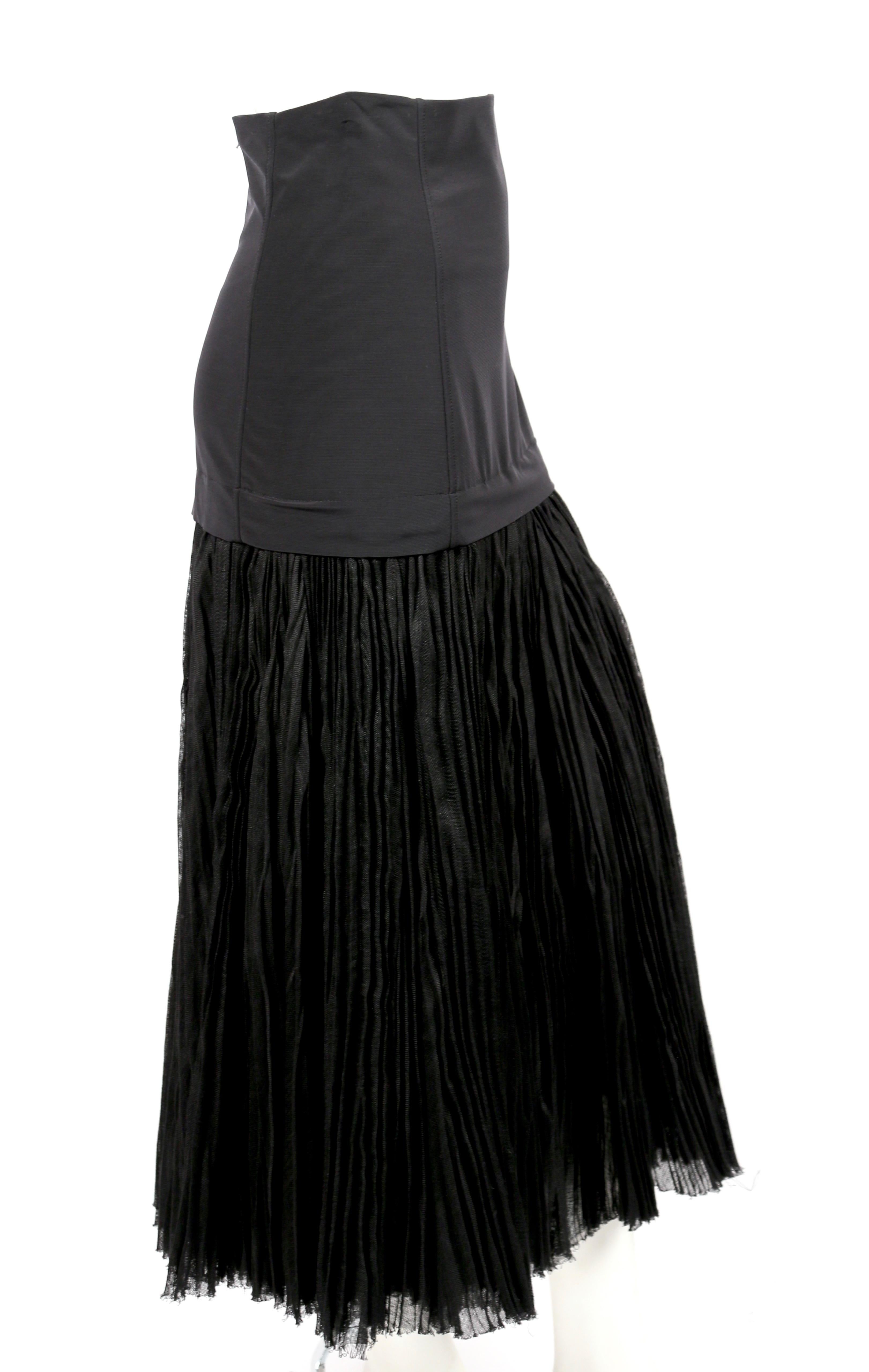 Jet-black flared skirt designed by Phoebe Philo for Celine exactly as seen on the runway for spring of 2014. Very flattering and comfortable fit.  Labeled a French size 38. Approximate measurements (un-stretched): 27