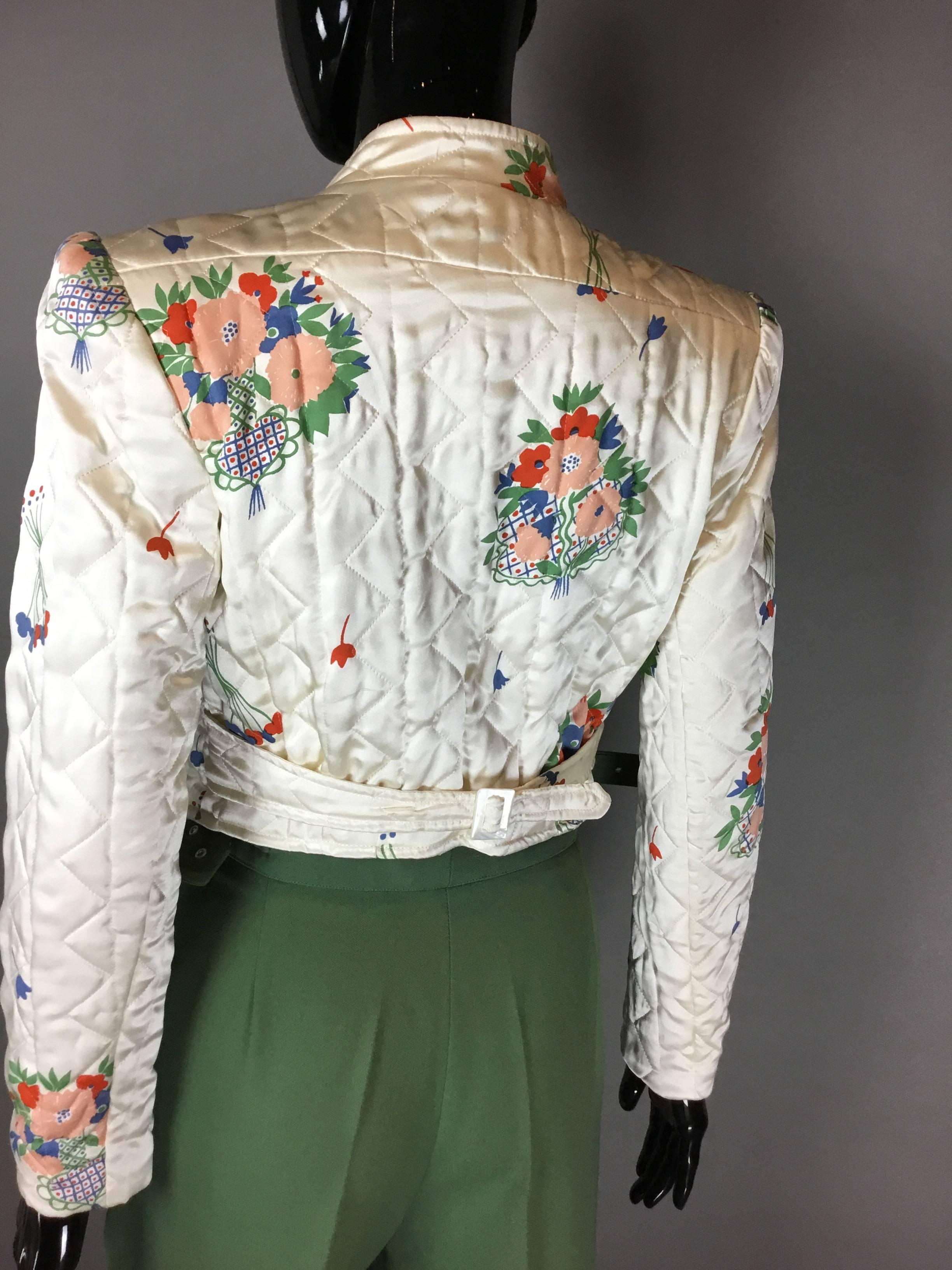 This really is a rare piece of Iconic 70s British designer Ossie Clark. his tailoring is much rarer to find. This suit was bought in auction from Ossies pattern cutter, and appears unworn.
The quilted cream satin slightly padded jacket is an almost