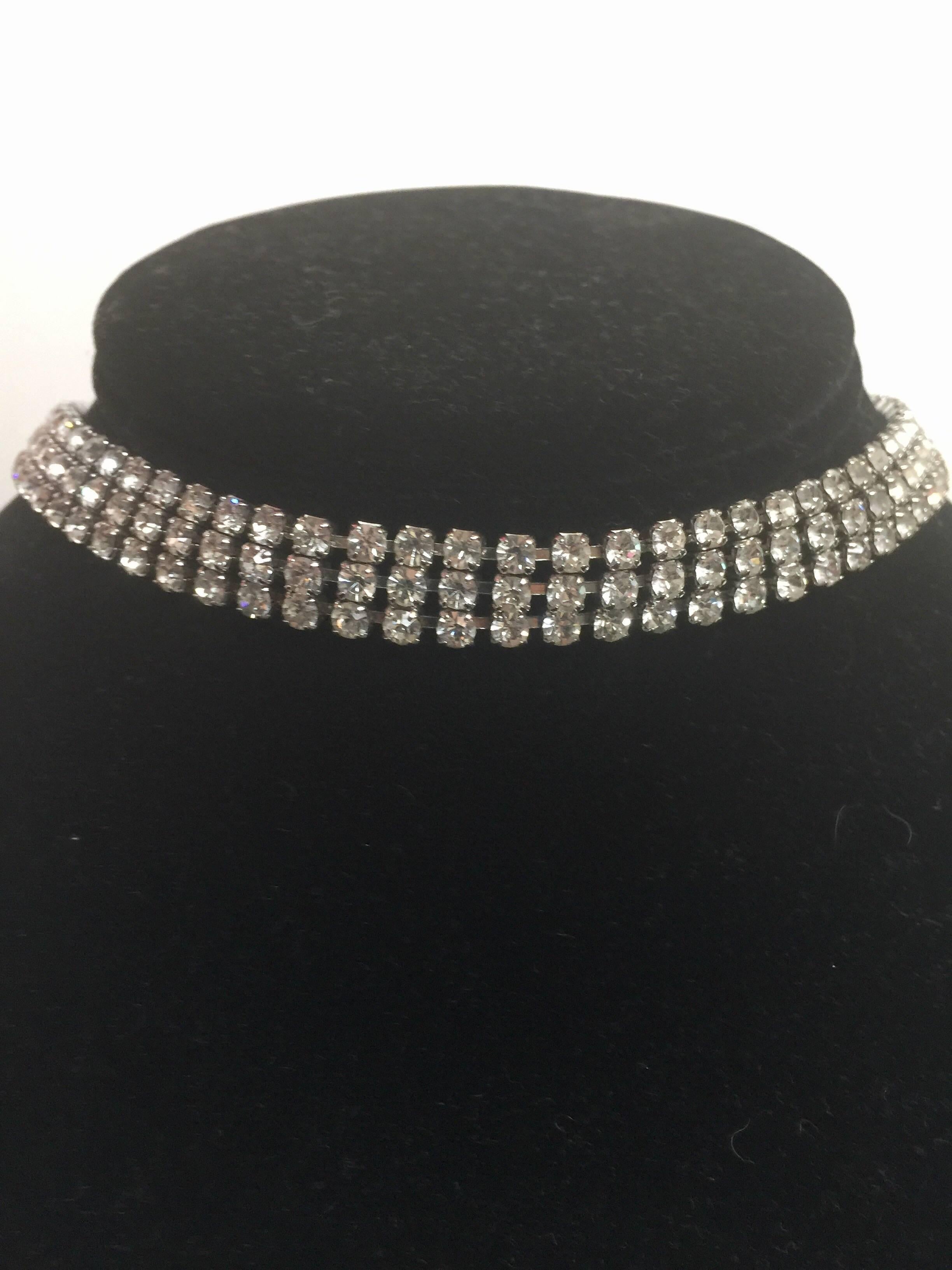 This simple yet elegant crystal diamanté choker is unsigned but in beautiful condition.  It is adjustable in size from 13"-15"