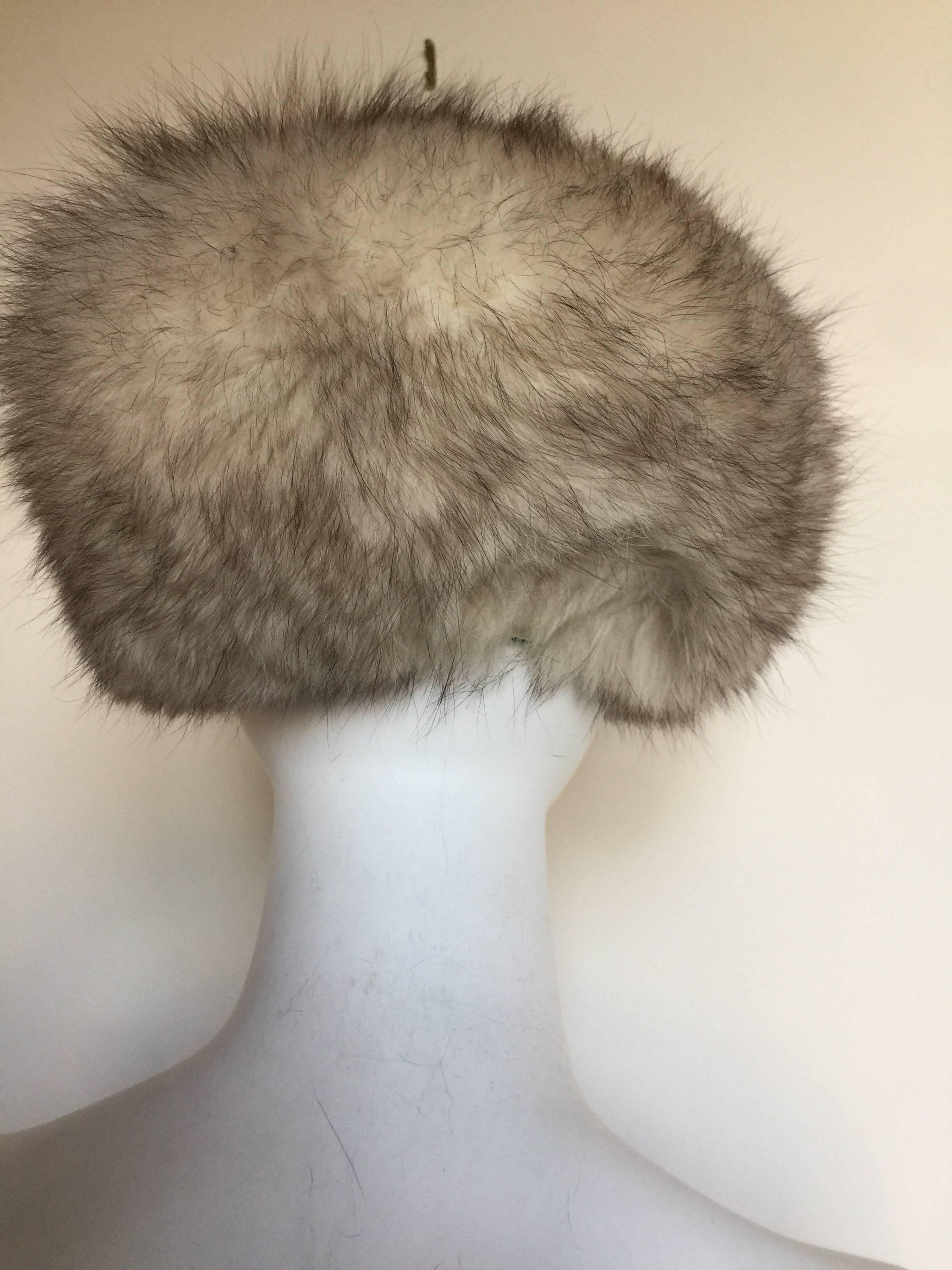 This fox hat is a classic and in good condition.  The fur is slightly crushed in the back but hardly noticeable - as shown in pictures. 