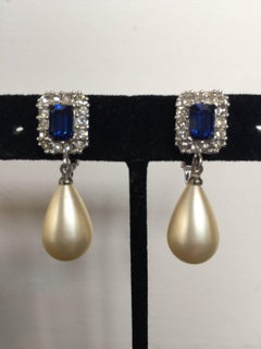 Faux pearl and emerald earrings