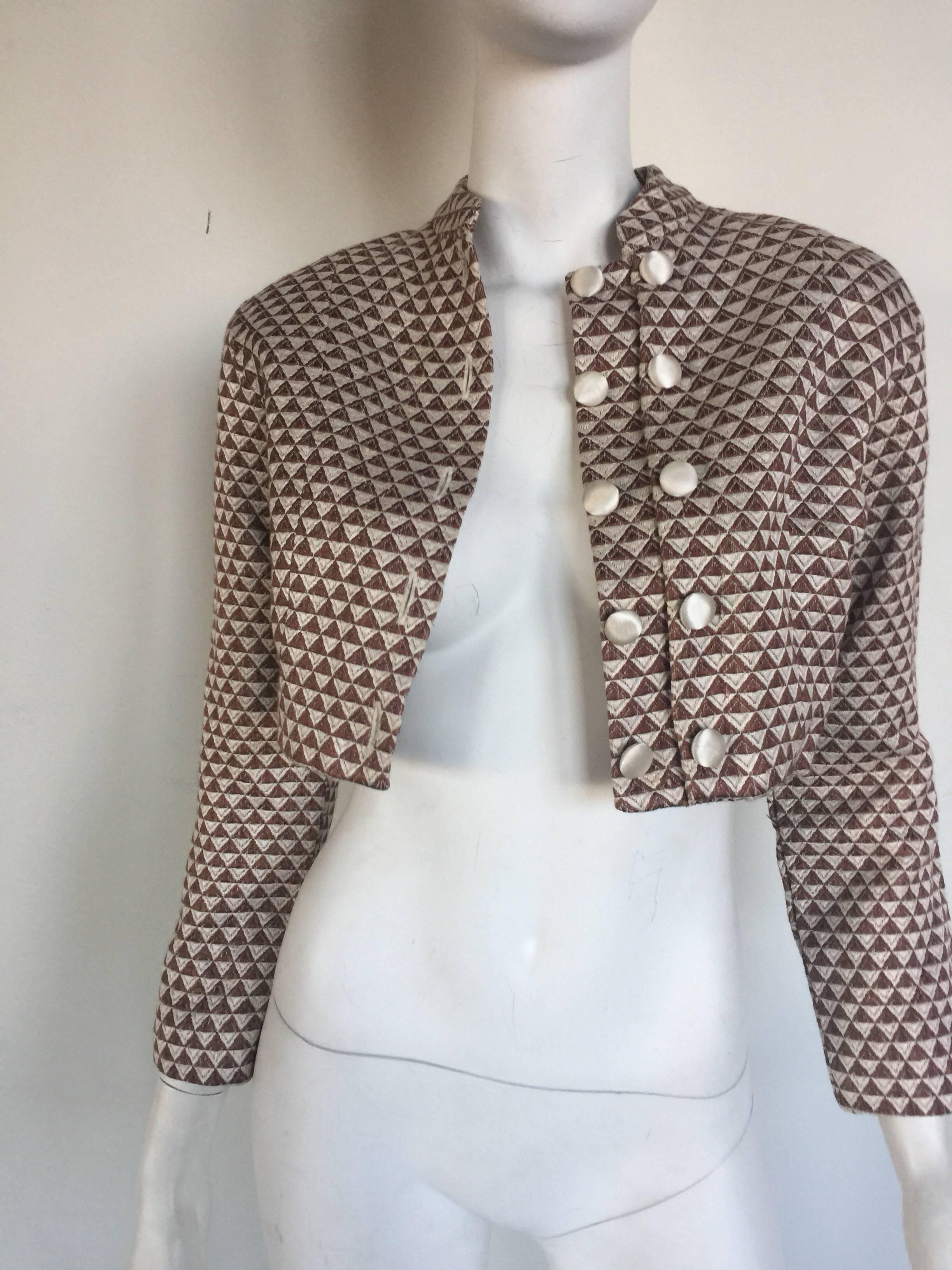 This coating tan and cream cropped jacket is from Passport by Pier Imports.  It is a really cool textile print and easy little jacket. 
