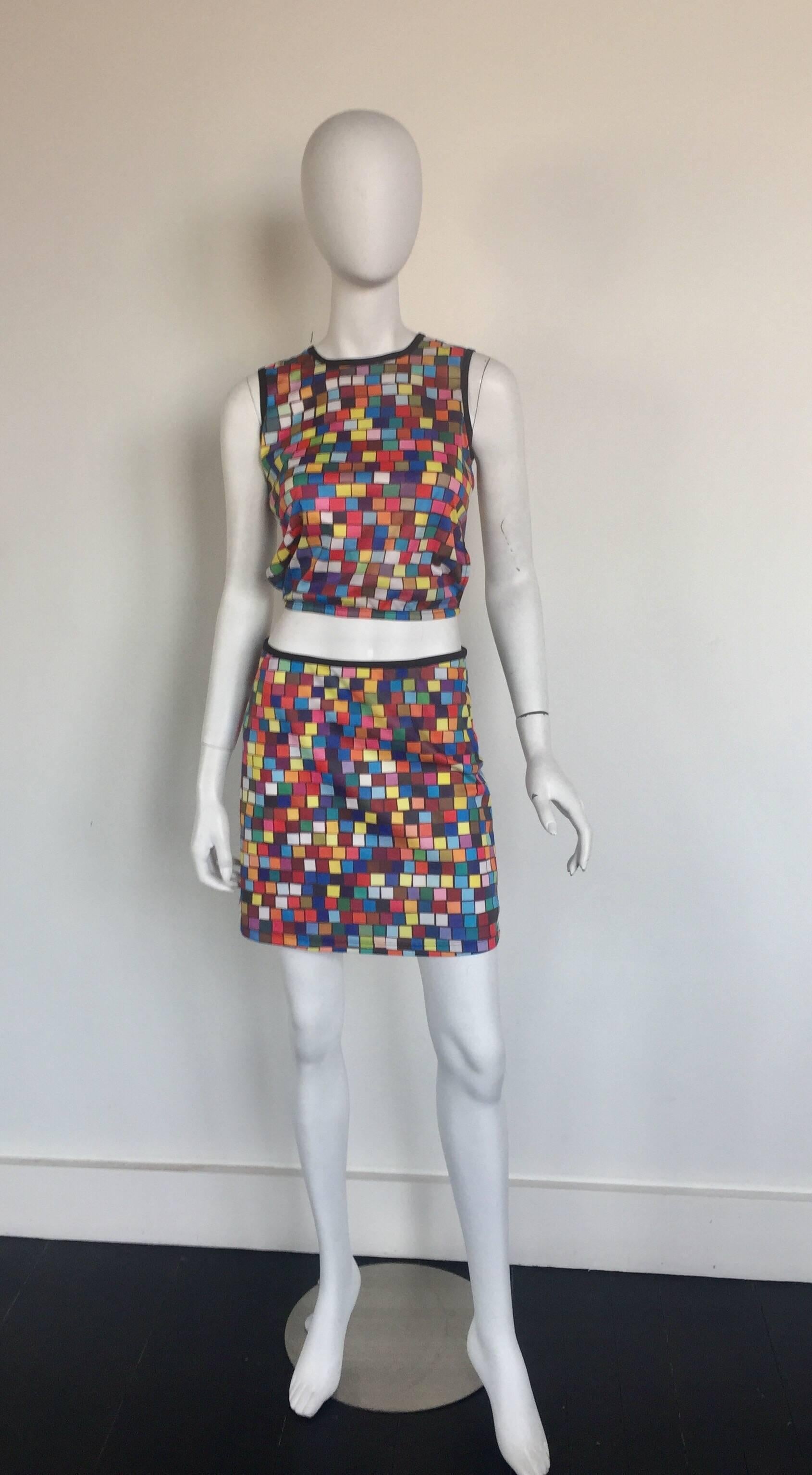This multi colored square print Todd Oldham ensemble is iconic of the 1990s.  It was a spring 1996 collection and this is a cropped top and skirt set. 