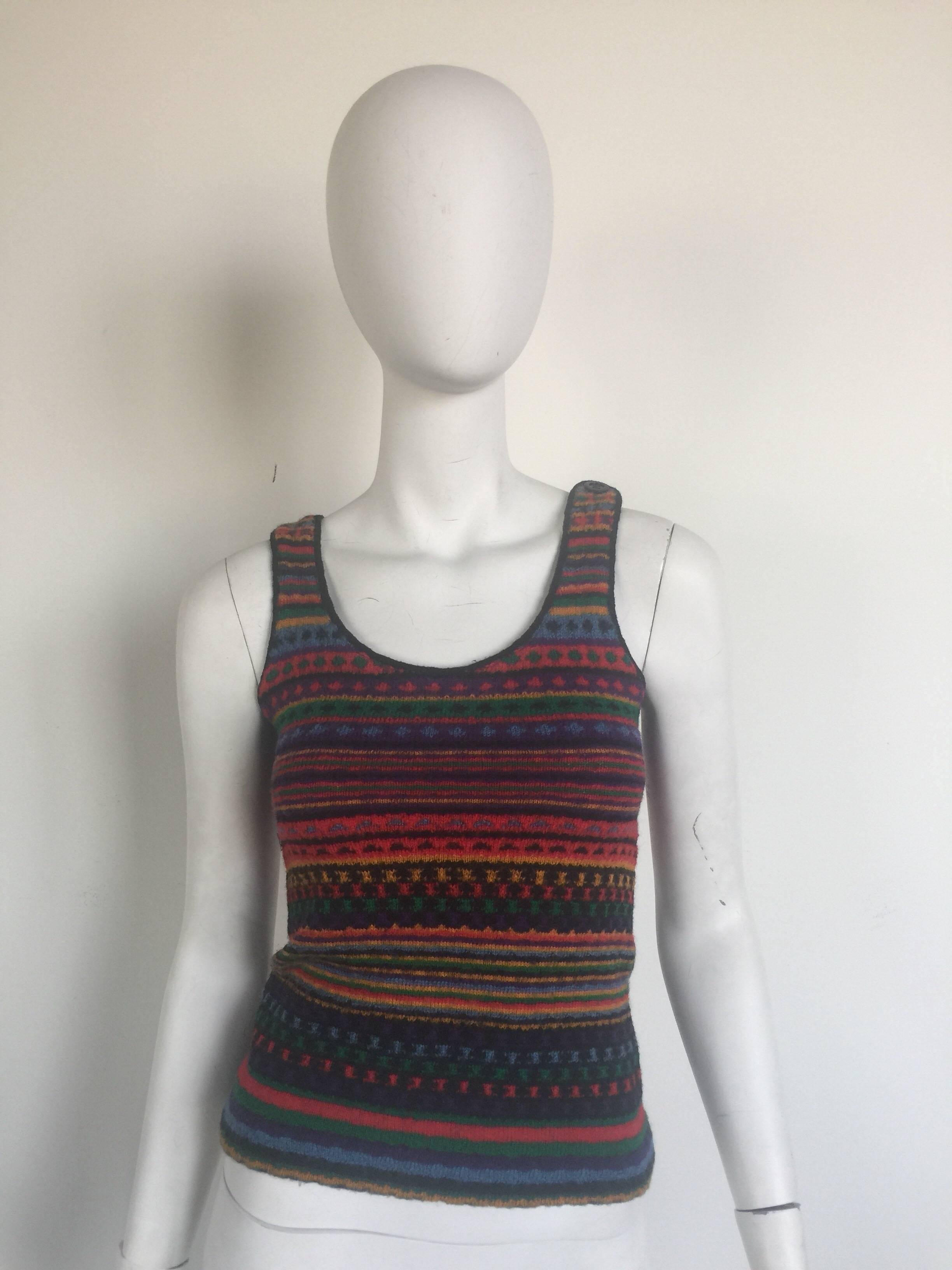 This 1970s Missoni tank top is listed a size 42 but it is very small.  It has a button on one shoulder and slightly cropped. 