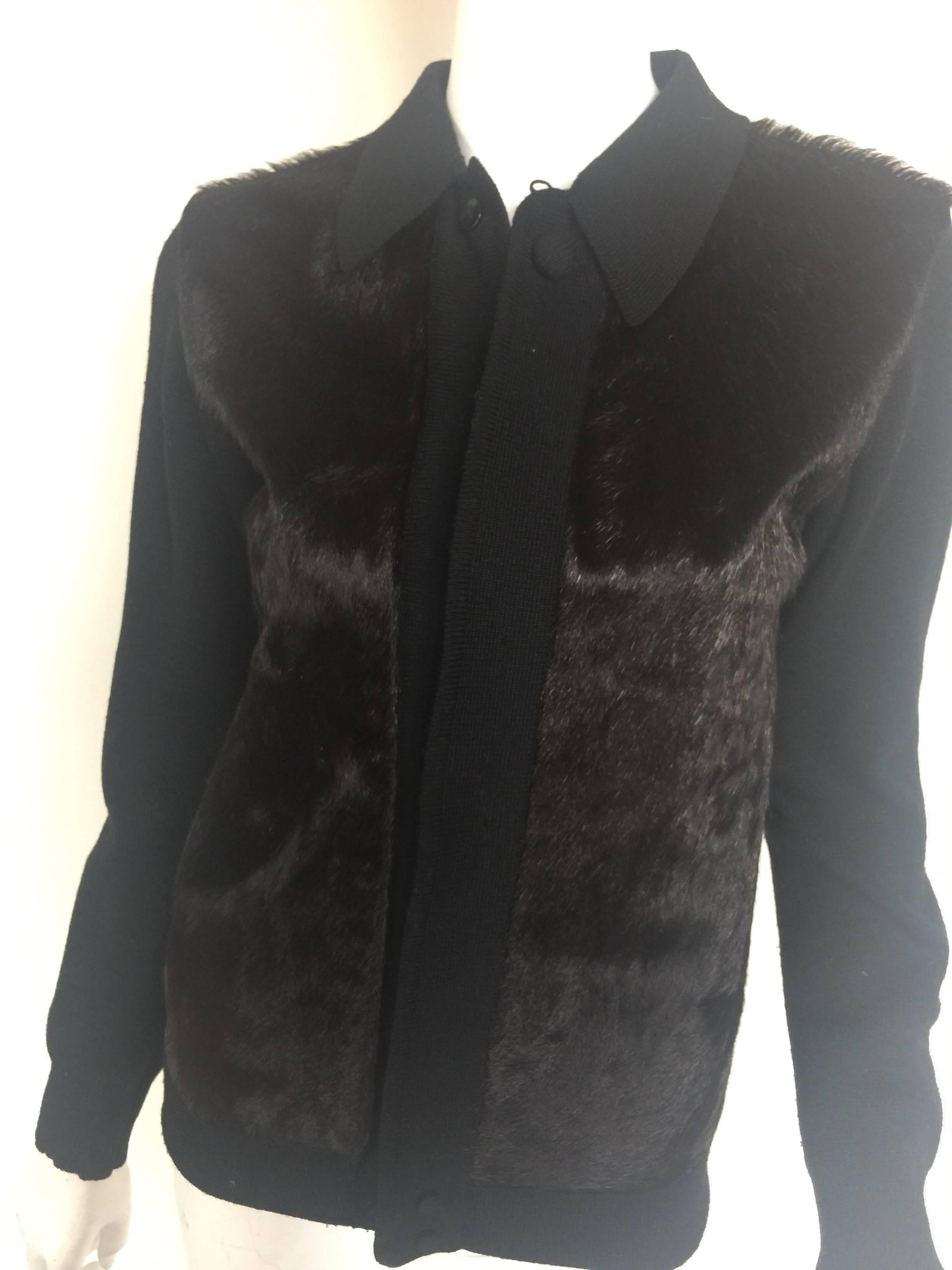 This black knot cardigan has dark brown/black cowhide panel in the front.  It fits a small but please check measurements.