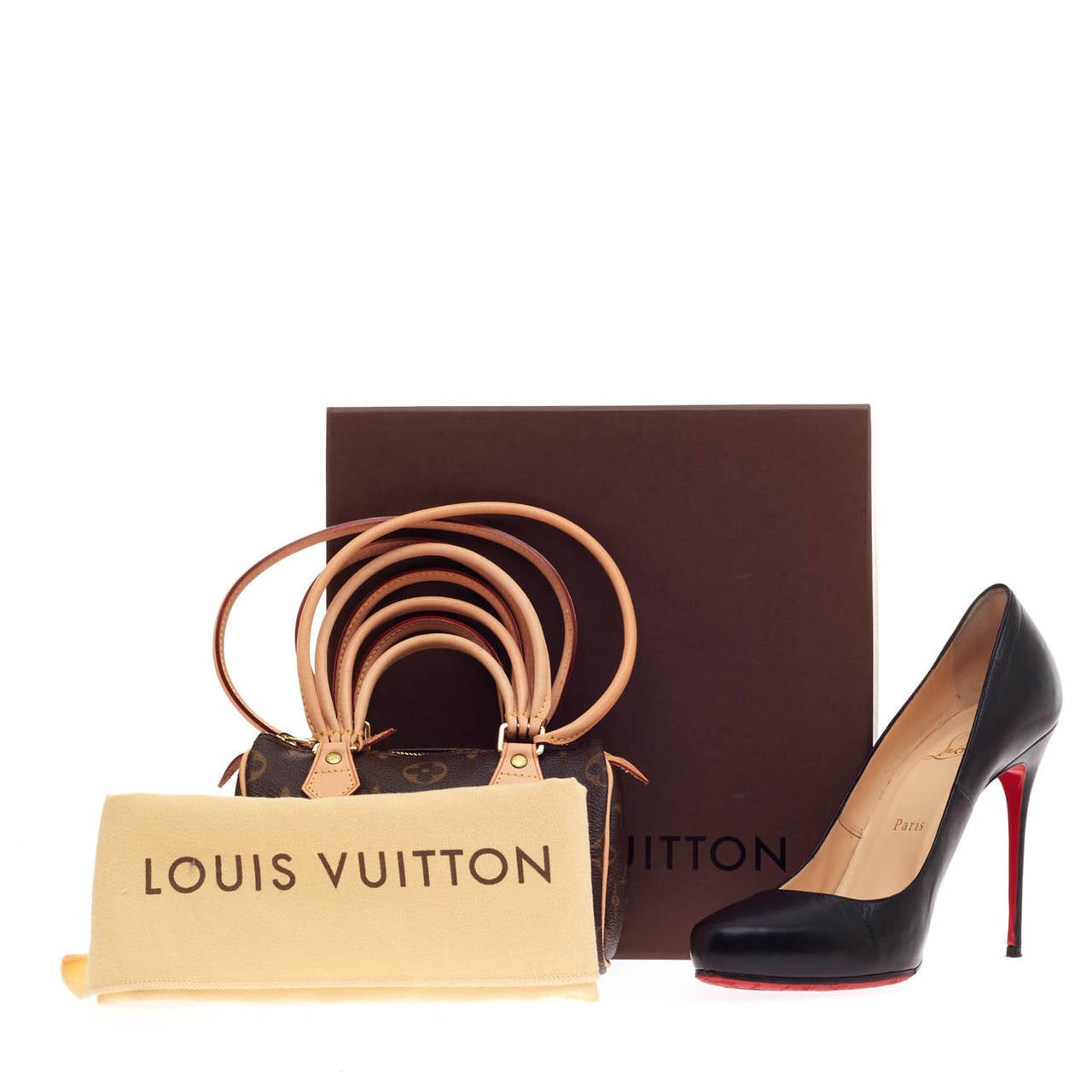 Cette édition limitée de Louis Vuitton Multi Handle Mini HL conçue en 2008 par le designer emblématique Rei Kawakubo de Comme des Garçons est le rêve ultime du collectionneur. Fabriqué en exclusivité pour le 30e anniversaire de Louis Vuitton au