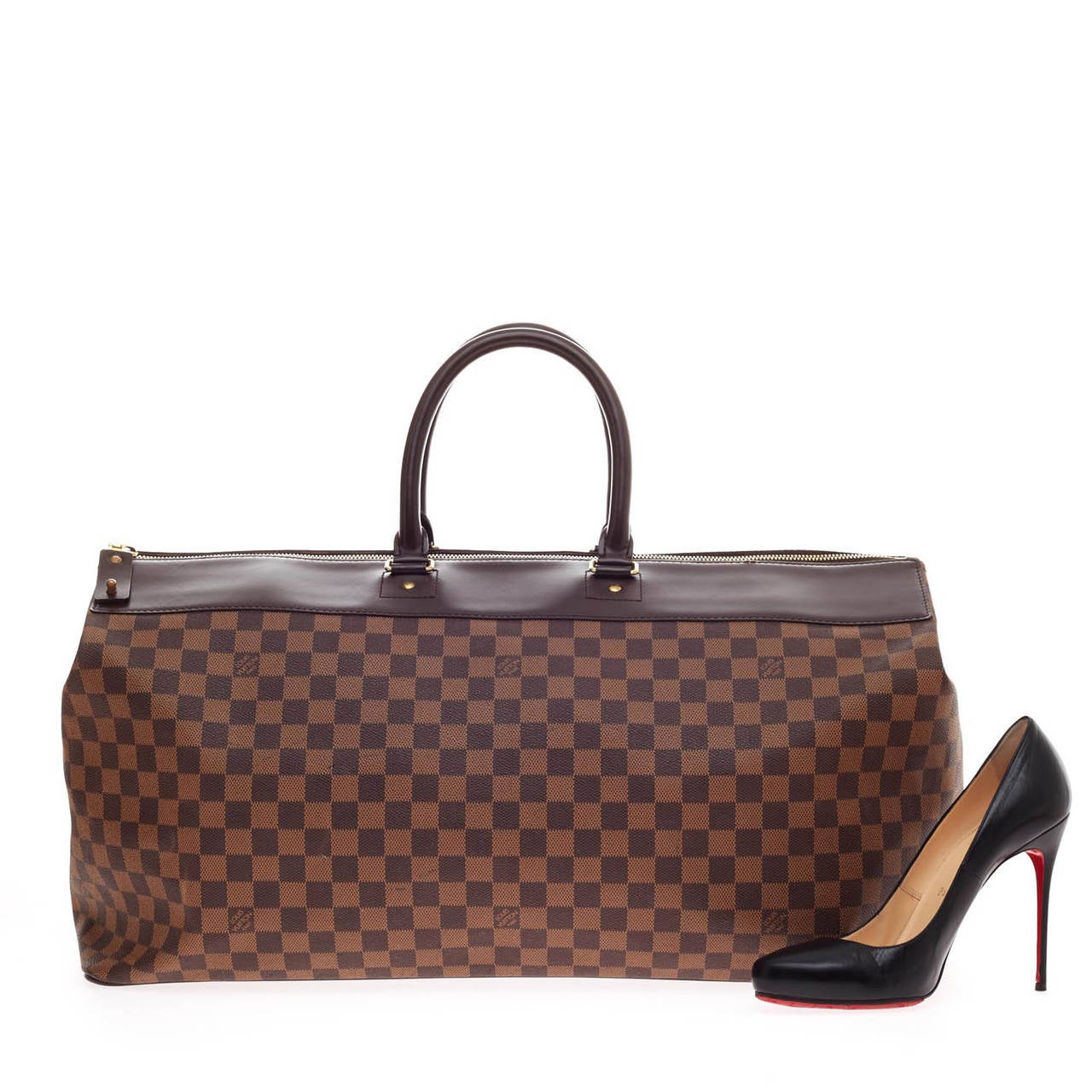Combining style with functionality, this authentic Louis Vuitton Greenwich in size GM designed in classic Damier Ebene Monogram print and coated canvas is the perfect travel companion. This limited luggage bag features a sturdy top leather panel