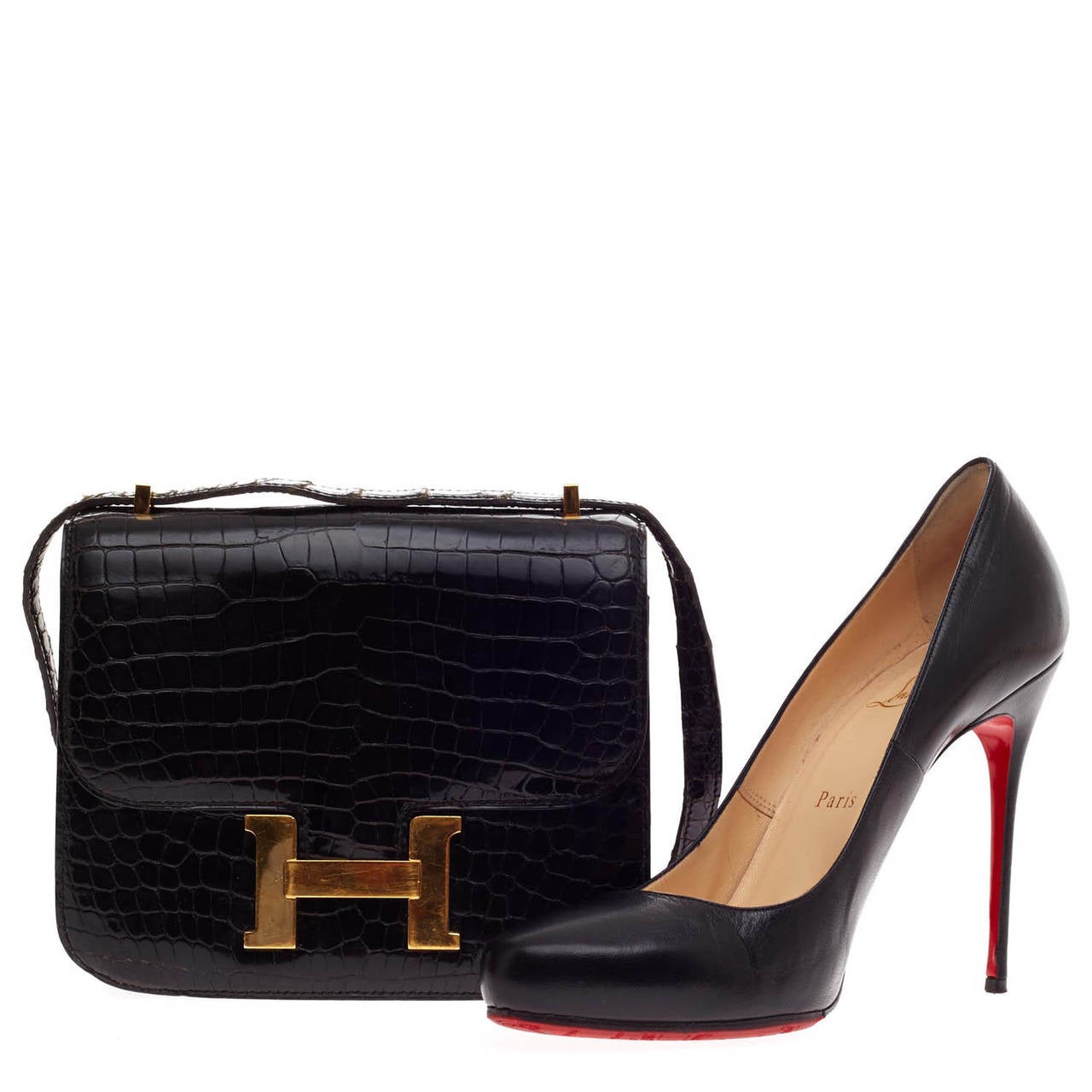 One of the rarest luxury pieces to find, this Hermes Constance 18 in black glossy Crocodile Porosus stands a cut above the rest. Designed first in 1959, this Hermes box bag is simple in design but elegantly timeless in nature. The long strap enables