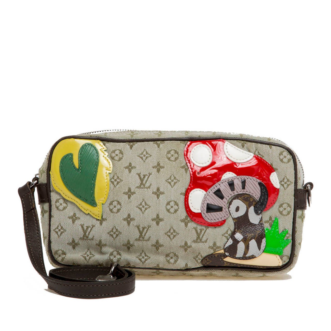 This authentic limited edition Louis Vuitton Conte de Fees Mushroom Pochette comes from Marc Jacob's highly inspired 