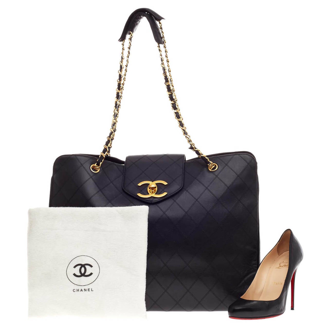 This rare authentic Chanel Supermodel Weekender size Jumbo in black diamond quilted leather is a stylish solution to all your travel needs. This oversized tote is accented with Chanel's signature leather woven chain straps and accompanied with