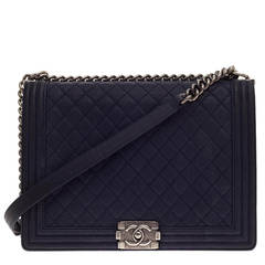 Chanel Old Medium Navy Quilted Caviar Boy Bag by Ann's Fabulous Finds