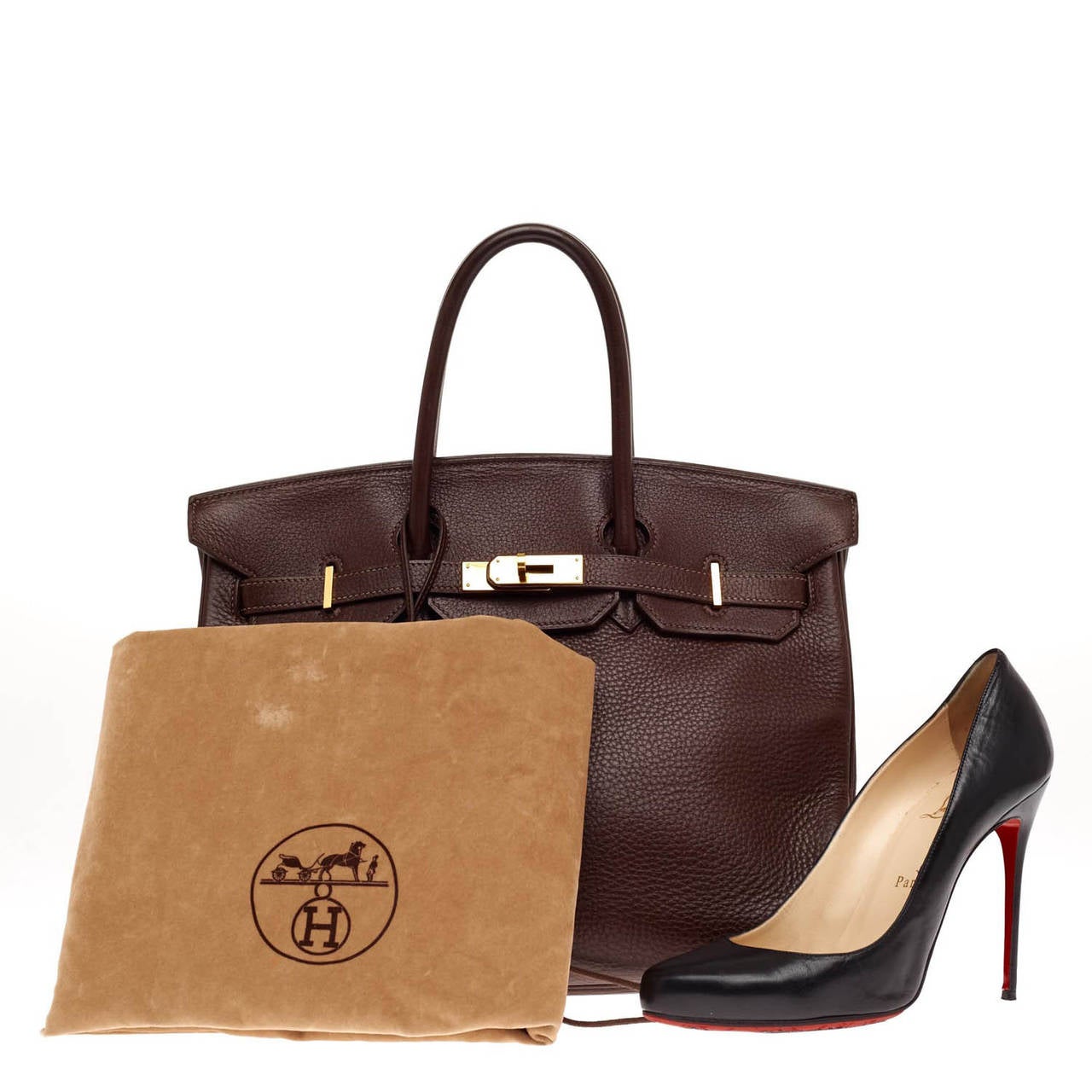 This iconic authentic Hermes Birkin in Chocolate with Gold Hardware in size 35 is the quintessential dream bag for the modern woman. Crafted in luxurious Clemence leather features dual-rolled top handles, frontal flap, polished gold turn lock