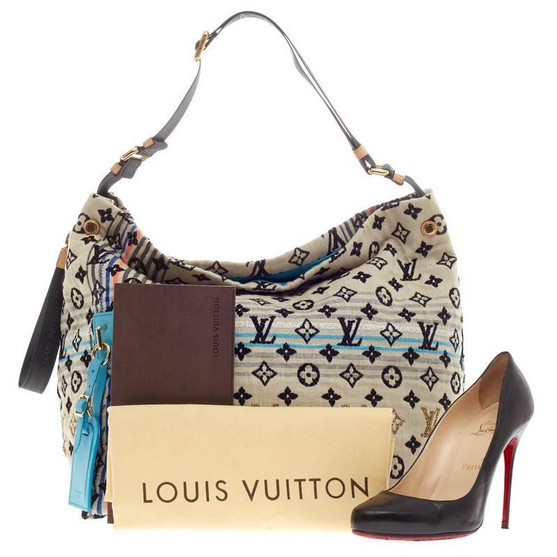 This authentic Louis Vuitton Cheche Bohemian Monogram Jacquard Canvas presented in the brand's Spring/Summer 2010 Collection is unique and playful in design ideal for free-spirited, chic fashionistas. Inspired by its distinct and refined