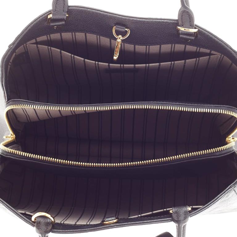 Louis Vuitton Womens Montaigne Black Empreinte Leather MM ref