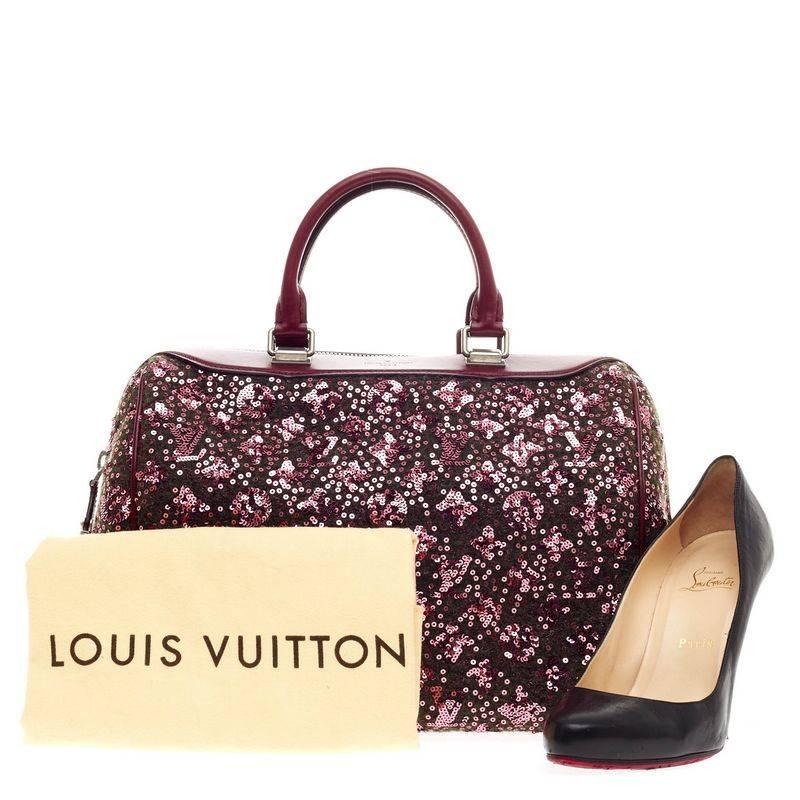 This authentic Louis Vuitton Speedy Limited Edition Sunshine Express 30 is a glittery twist on the classic speedy design - adorned in luminous sequins. Presented at the brand's Fall/Winter 2012 Collection, this burgundy embroidered wool bag is