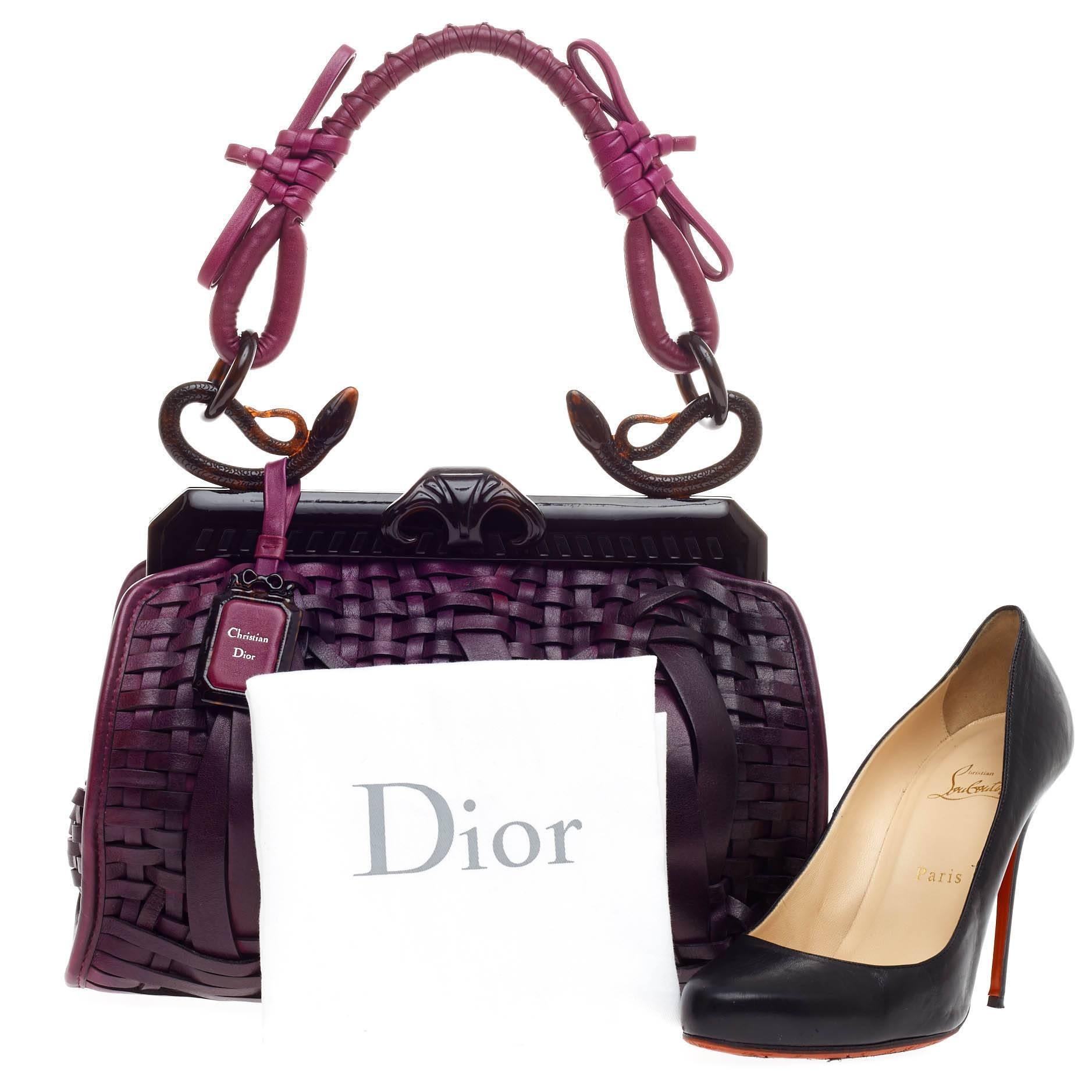 This authentic Christian Dior 1947 Samourai Bag Woven Leather Medium created for the brand's 60th Anniversary merges tieless elegance from the 1940's with definitive Japanese elements. Designed by John Galliano in degrade purple calfskin bladed and