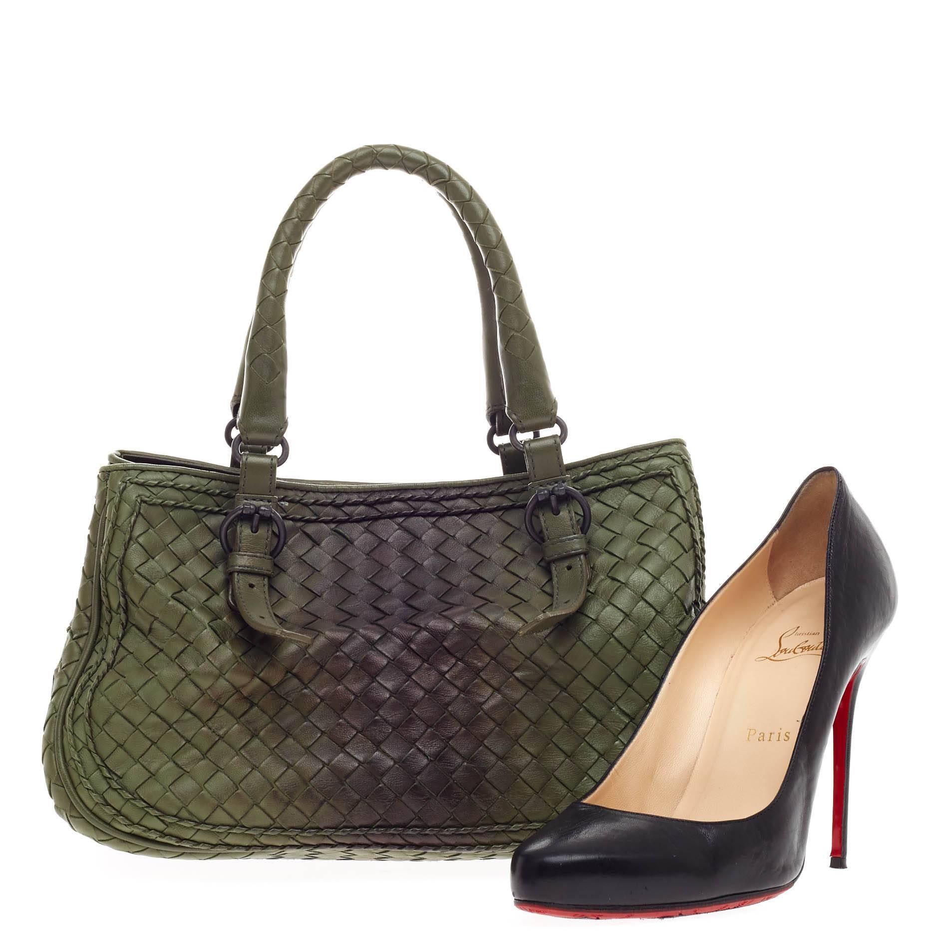 This authentic Bottega Veneta Belted Double Stitch Satchel Ombre Intrecciato Nappa Small presented in the brand's 2007 Collection is a timelessly elegant bag with a casual silhouette. Constructed from green and black nappa leather woven in Bottega
