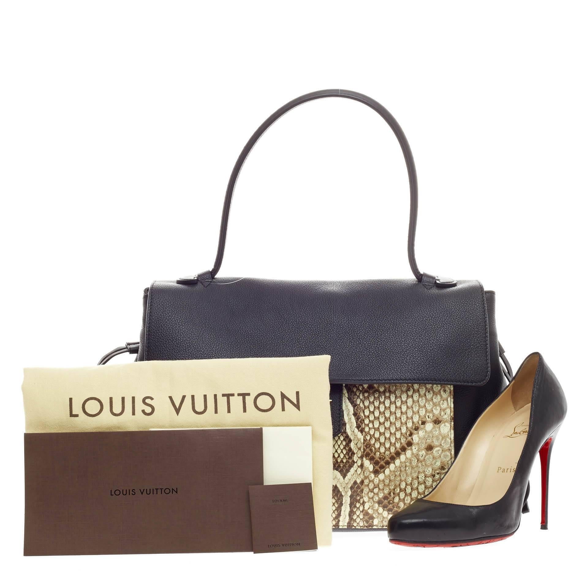 This authentic Louis Vuitton Lockme Leather and Python MM released in the brand's 2015 Cruise Collection is a must-have, luxurious signature satchel made for the modern woman. Crafted in noir black calfskin leather with genuine light brown python