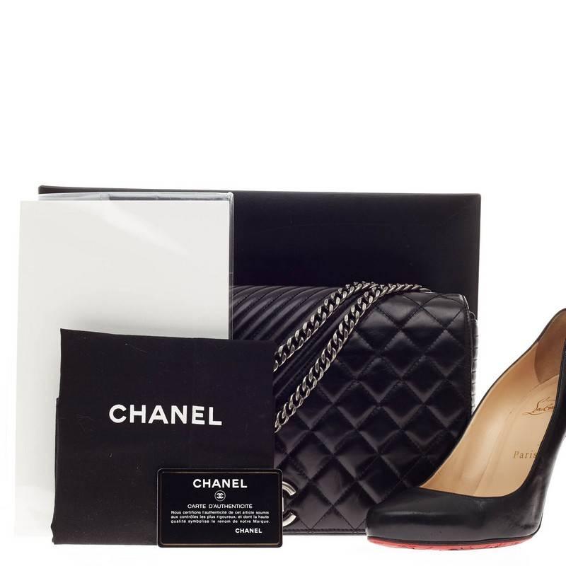 This authentic Chanel Coco Boy Flap Quilted Lambskin Large presented in the brand's Spring 2015 Collection combines classic Chanel craftsmanship with definitive style fit for the contemporary woman. Finely crafted in combined diamond, diagonal and