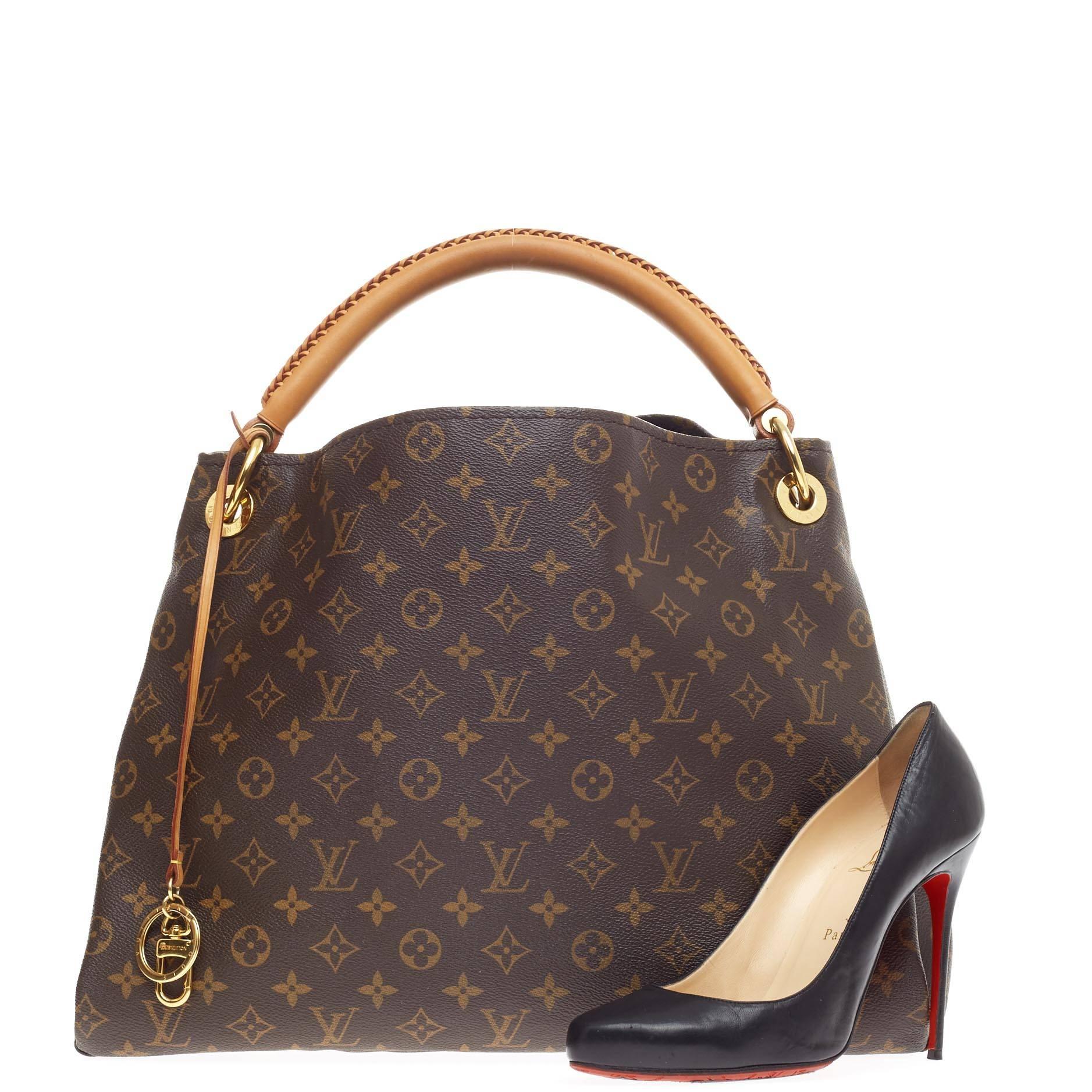 Diese authentische Louis Vuitton Artsy Monogram Canvas MM ist eine elegante und ikonische Tasche:: die jedem Outfit ein stilvolles Flair verleiht. Diese geräumige Artsy Hobo ist aus dem ikonischen Louis Vuitton Monogramm-Canvas gefertigt und verfügt