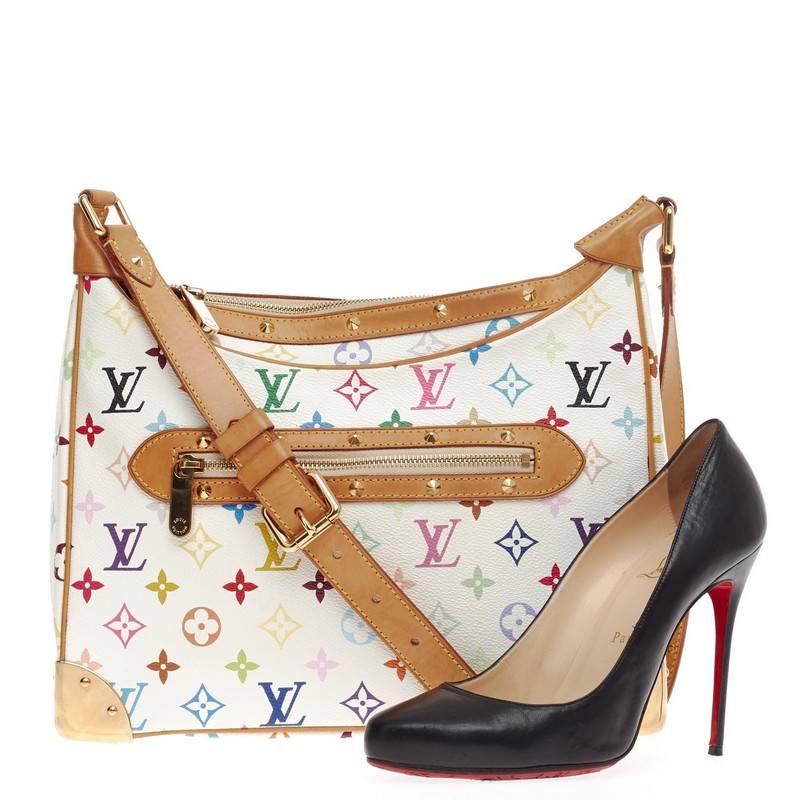 This authentic Louis Vuitton Boulogne Monogram Multicolor showcases a stylish and stunning design perfect for everyday use. Crafted from white monogram multicolor printed canvas, this satchel features an adjustable shoulder strap, vachetta leather