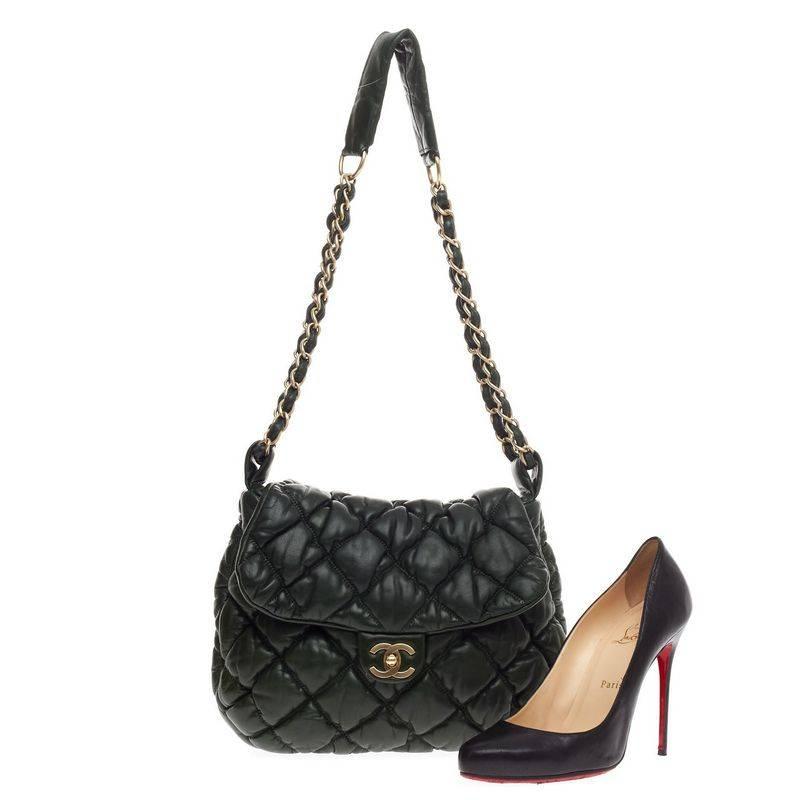 This authentic Chanel Bubble Quilt Flap Bag Lambskin Medium is sure to compliment just about every casual outfit. Crafted from vivid dark green lambskin leather in modern bubble quilting, this soft, puffy flap bag features woven-in leather chain