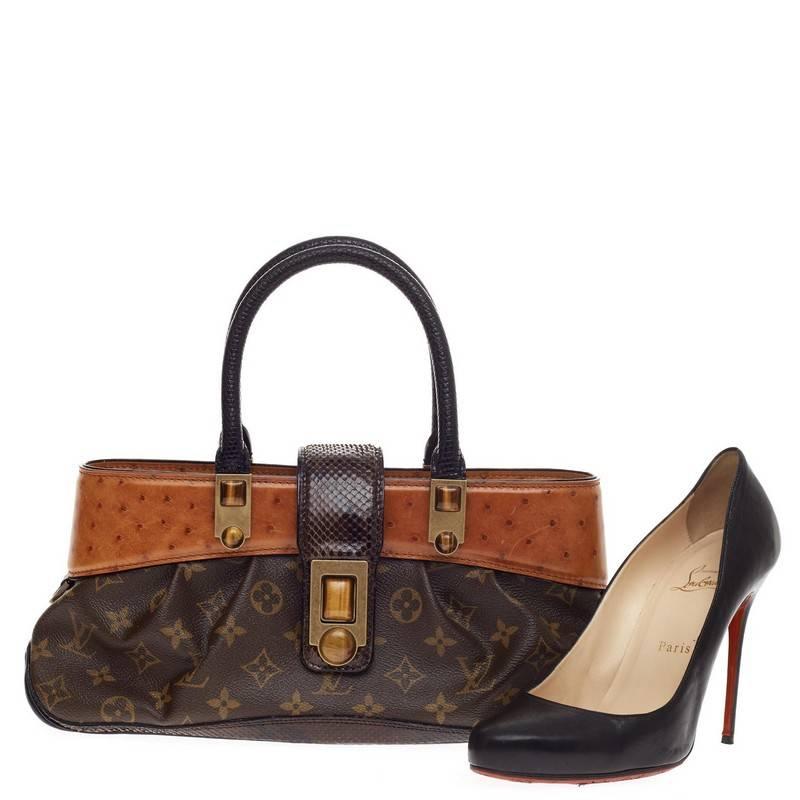 This authentic Louis Vuitton Limited Edition Macha Waltz Monogram Canvas and Exotics presented in the brand's 2005 Fall/Winter Collection is a must-have for LV lovers. Crafted from brown monogram printed canvas, this luxurious, hard-to-find tote