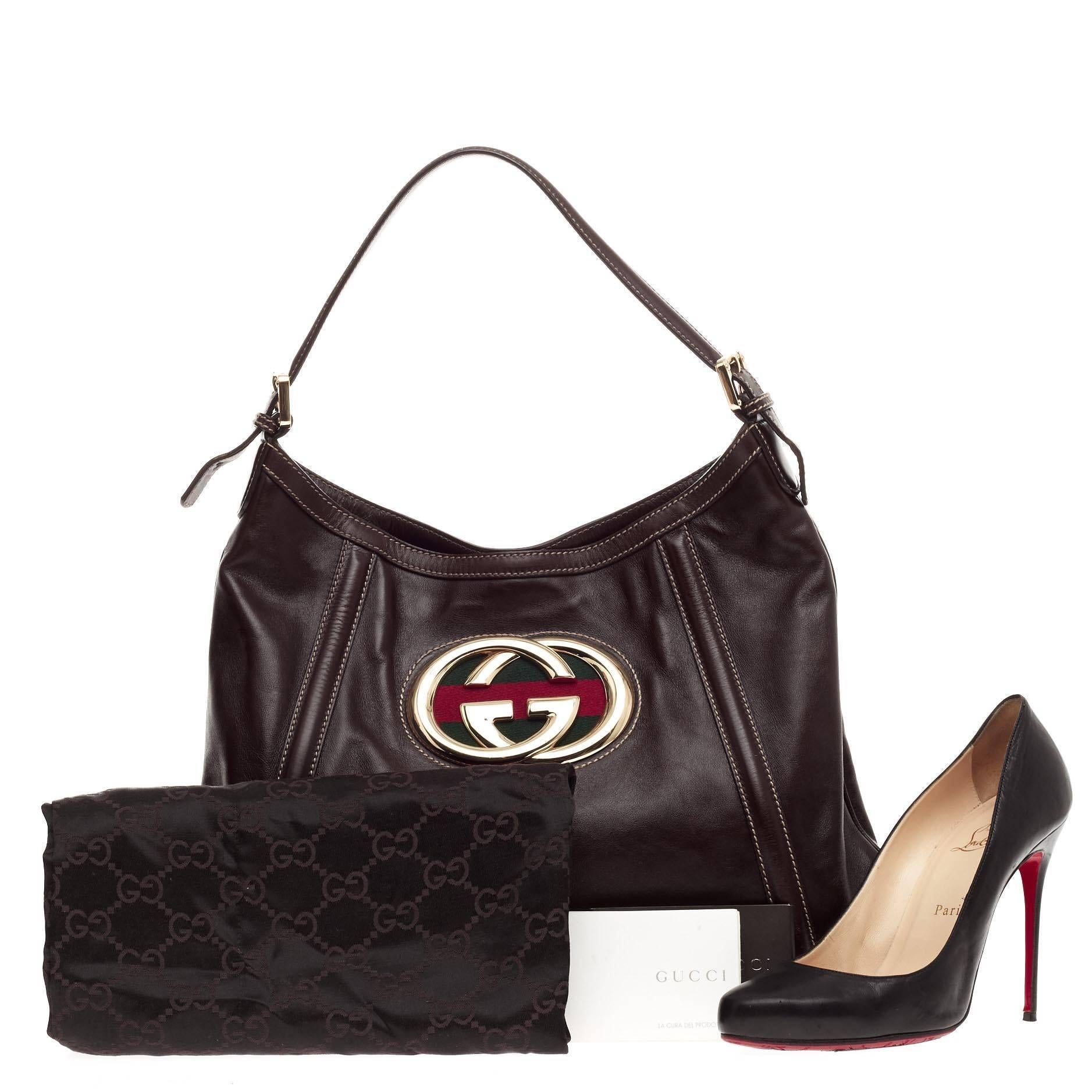 This authentic Gucci Britt Web Hobo Leather Medium is perfect for everyday use. Crafted from brown leather, this hobo features a single adjustable leather strap with buckle details, gold GG logo at its front with red and green Gucci web background,