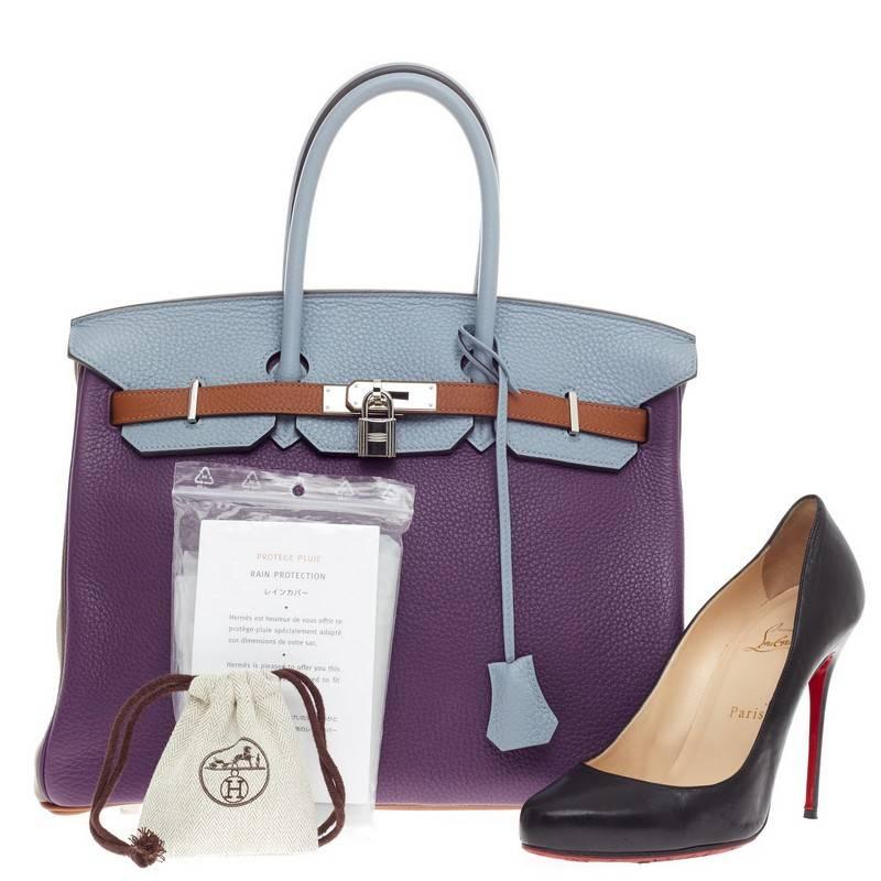 This authentic Hermes Birkin Arlequin Clemence 35 is a special edition, rare piece that graces only a few closets. Crafted in 6-color ultraviolet, etain, bleu lin, bleu obscur, etoupe and gold clemence leather, this coveted, scratch-resistant Birkin