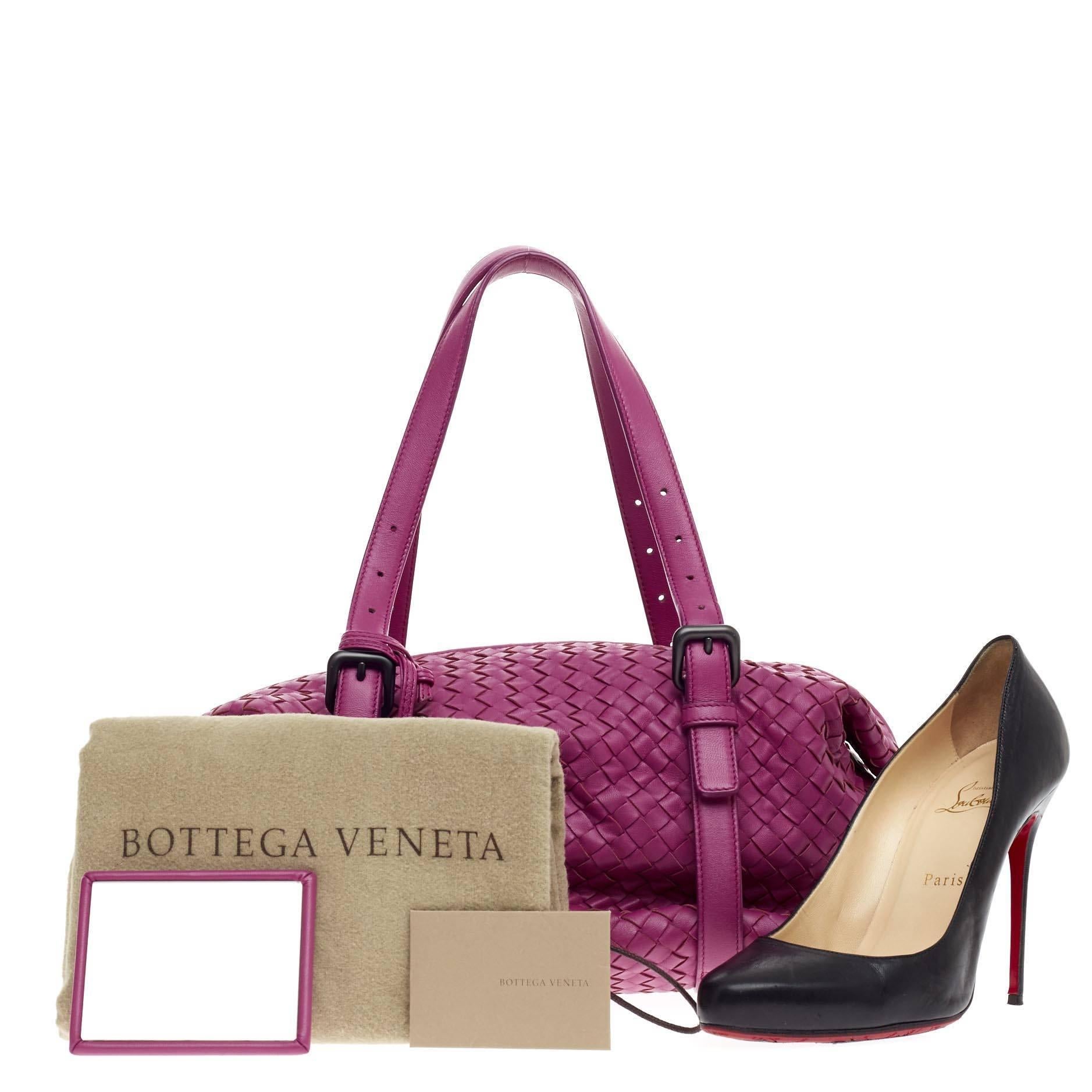 This authentic Bottega Veneta Montaigne Shoulder Bag Intrecciato Nappa Medium presented in the brand's 2011 Collection is a timelessly elegant bag with a casual silhouette made for everyday excursions. Crafted from vibrant orchid purple nappa