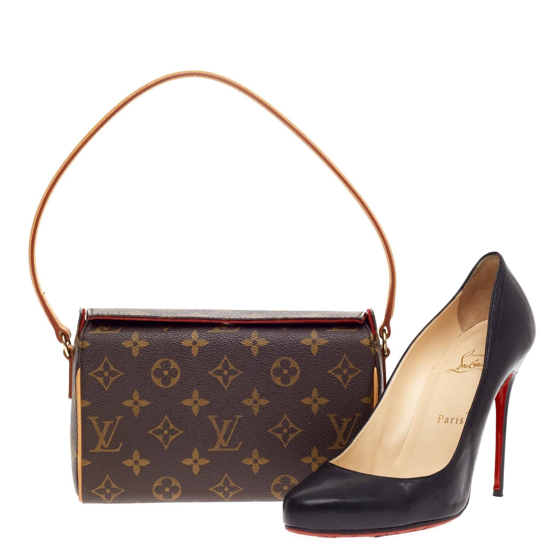 This authentic Louis Vuitton Recital Monogram Canvas is a versatile day-to-evening bag. Crafted from the brand's iconic brown monogram printed canvas, this petite shoulder bag features a single looped vachetta leather handle and trims, and gold-tone