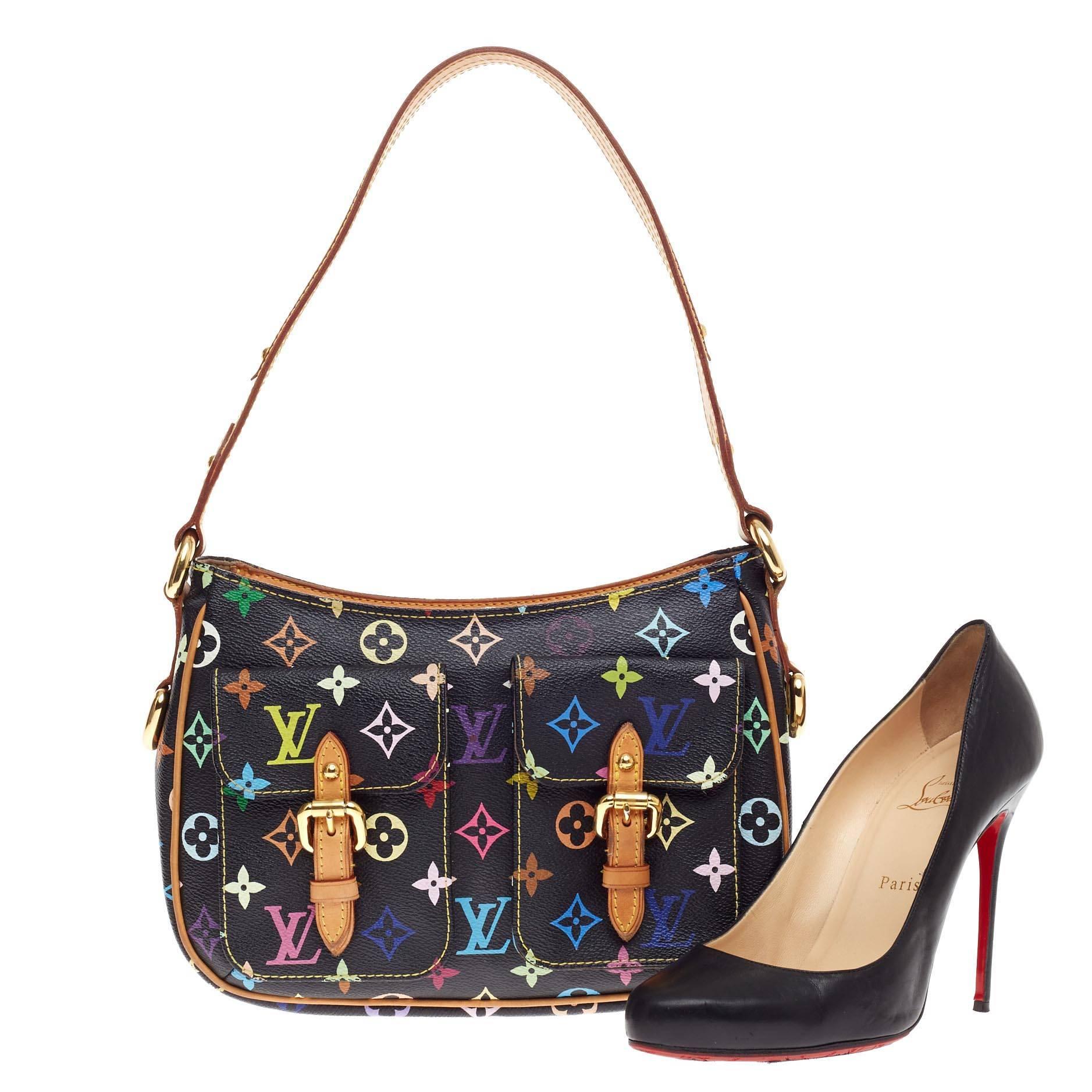 This authentic Louis Vuitton Lodge Monogram Multicolor PM combines style and functionality apt for the modern day woman. Constructed from Louis Vuitton's signature black monogram multicolor printed canvas, this classic shoulder bag features a wide