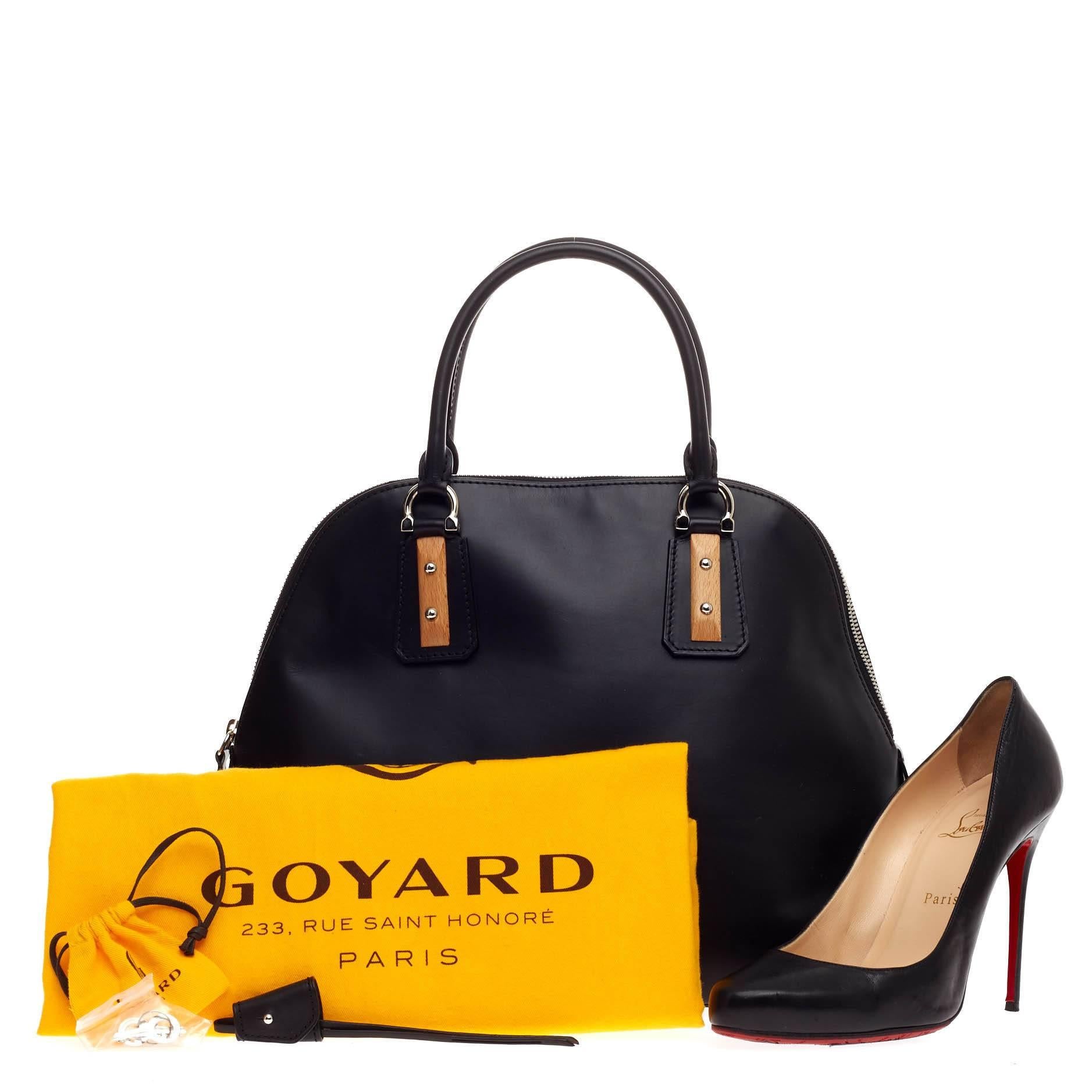 This authentic Goyard Sac Vendome Leather PM released in a limited edition 2010 Collection borrows its name from the famous Parisian square depiciting a classic, elegant style. Crafted from supple black leather with iconic print canvas detailing,