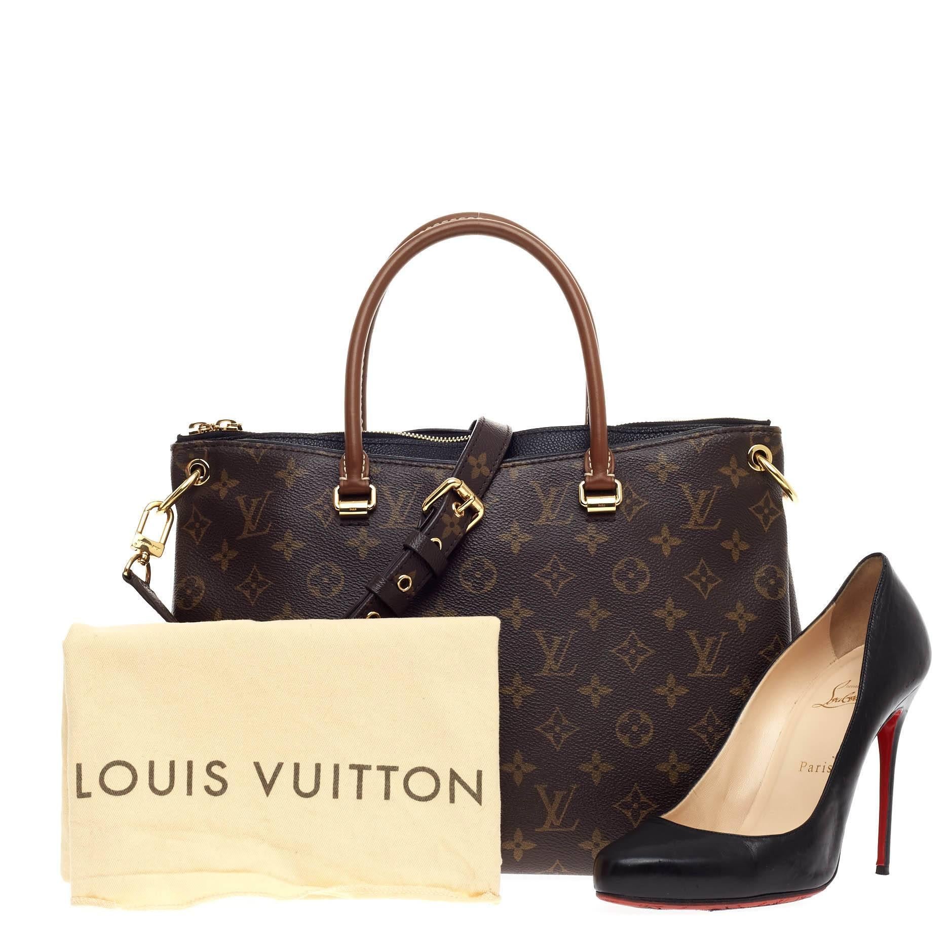 This authentic Louis Vuitton Pallas Tote Monogram Canvas is a mix of classic style with modern functionality. Released first in 2011, this structured satchel features the brand's signature monogram canvas print with peeking noir black calfskin